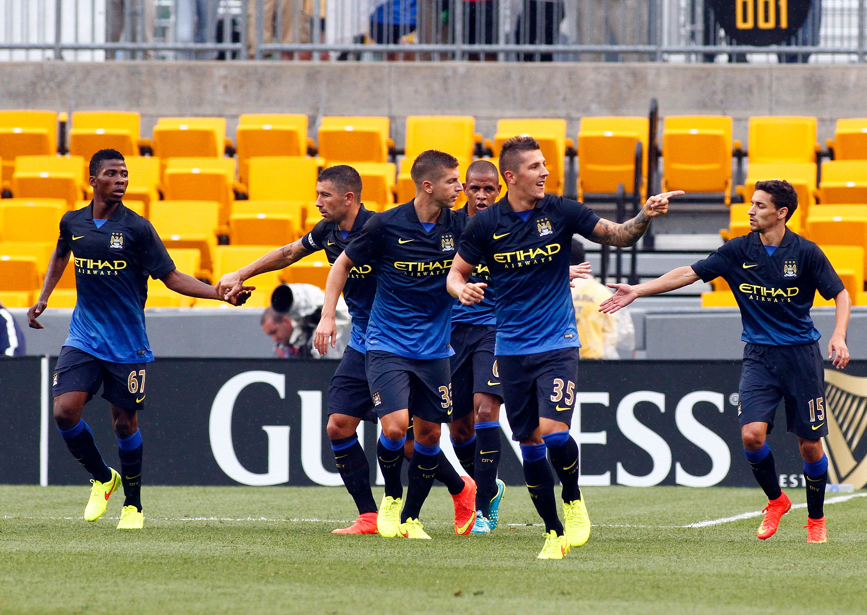 Stevan Jovetic celebrates scoring against AC Milan