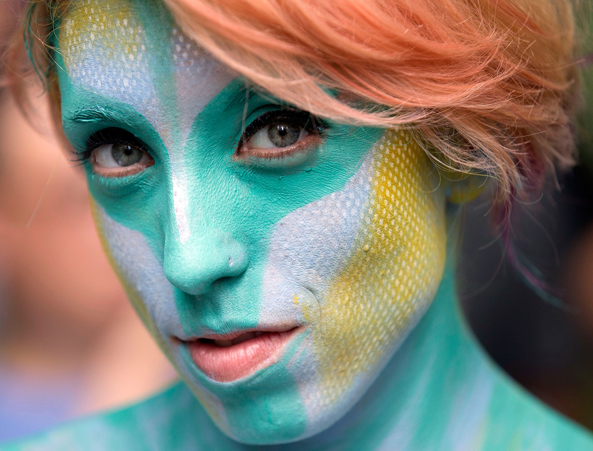 Desiree Urban is painted at Columbus Circle as body-painting artists gathered to decorate nude models as part of an event featuring artist Andy Golub, in New York. Golub says New York was the only city in the country that would allow his inaugural Bodypai