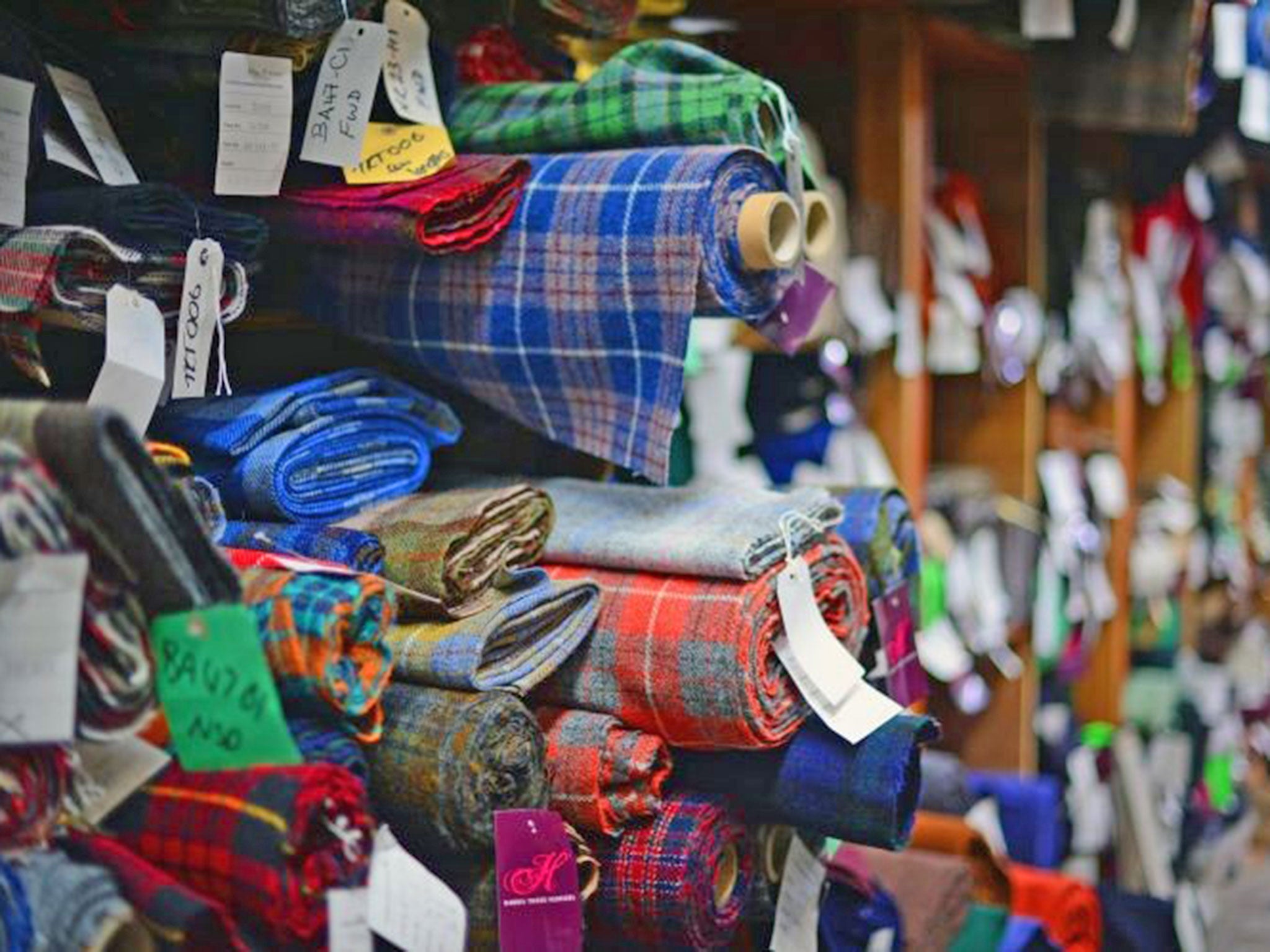 Roddy Martin works in the pattern room at the Harris Tweed Hebrides Company in Shawbost in Stornoway, Scotland