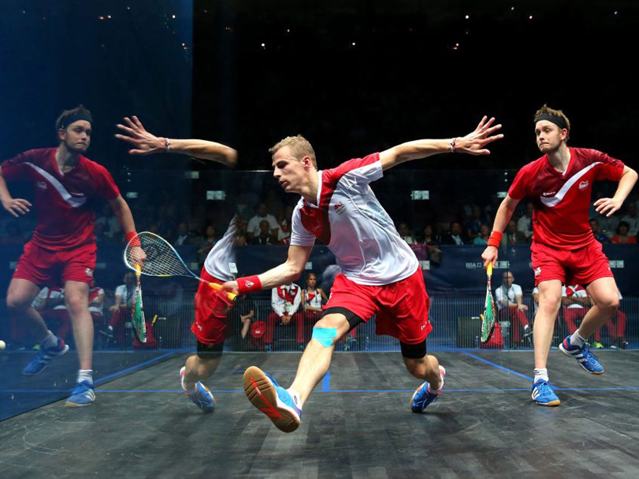 Nick Matthew, below centre, goes all out to beat James Willstrop for gold