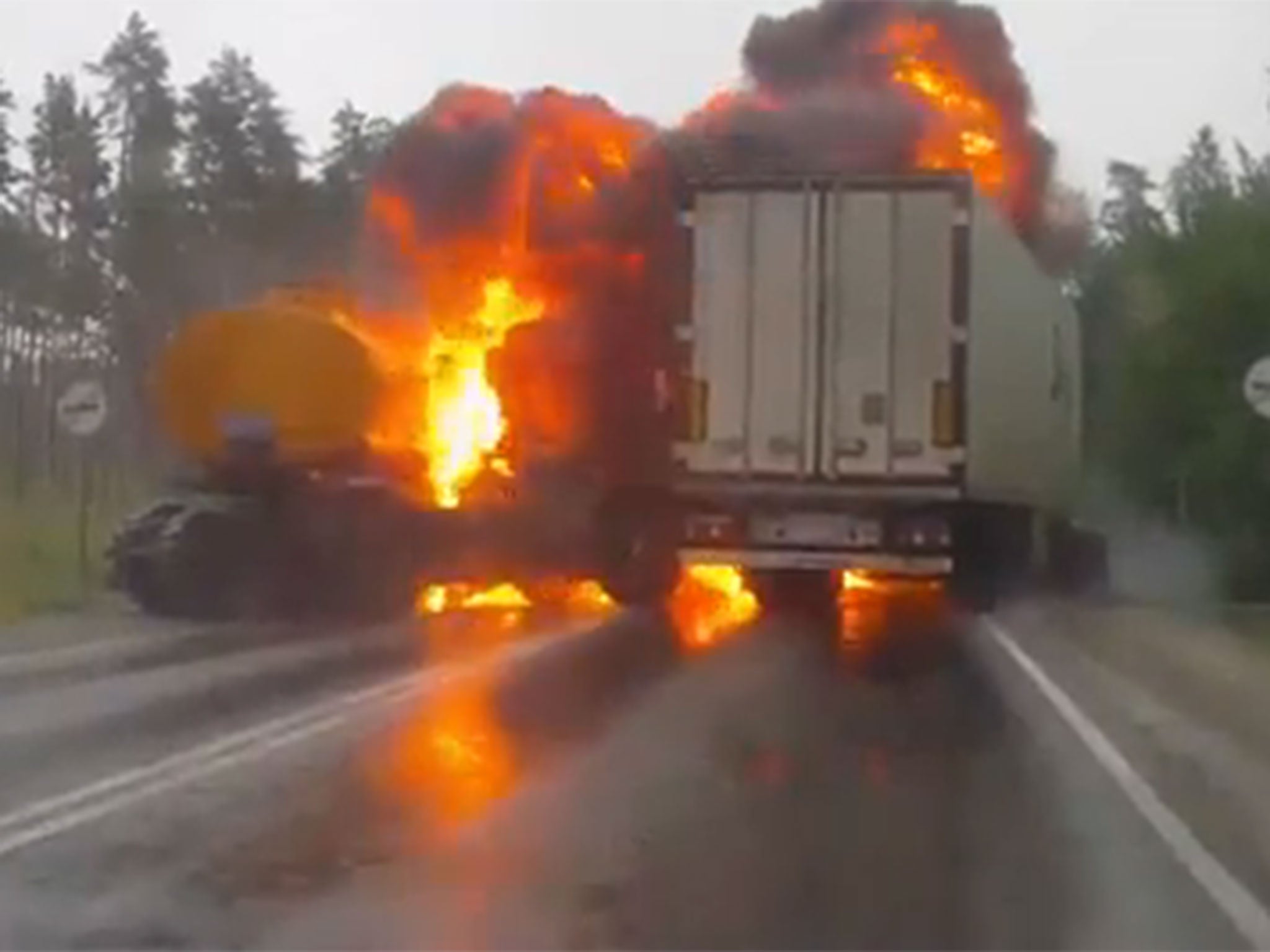 The tanker errupts in flames after the collision