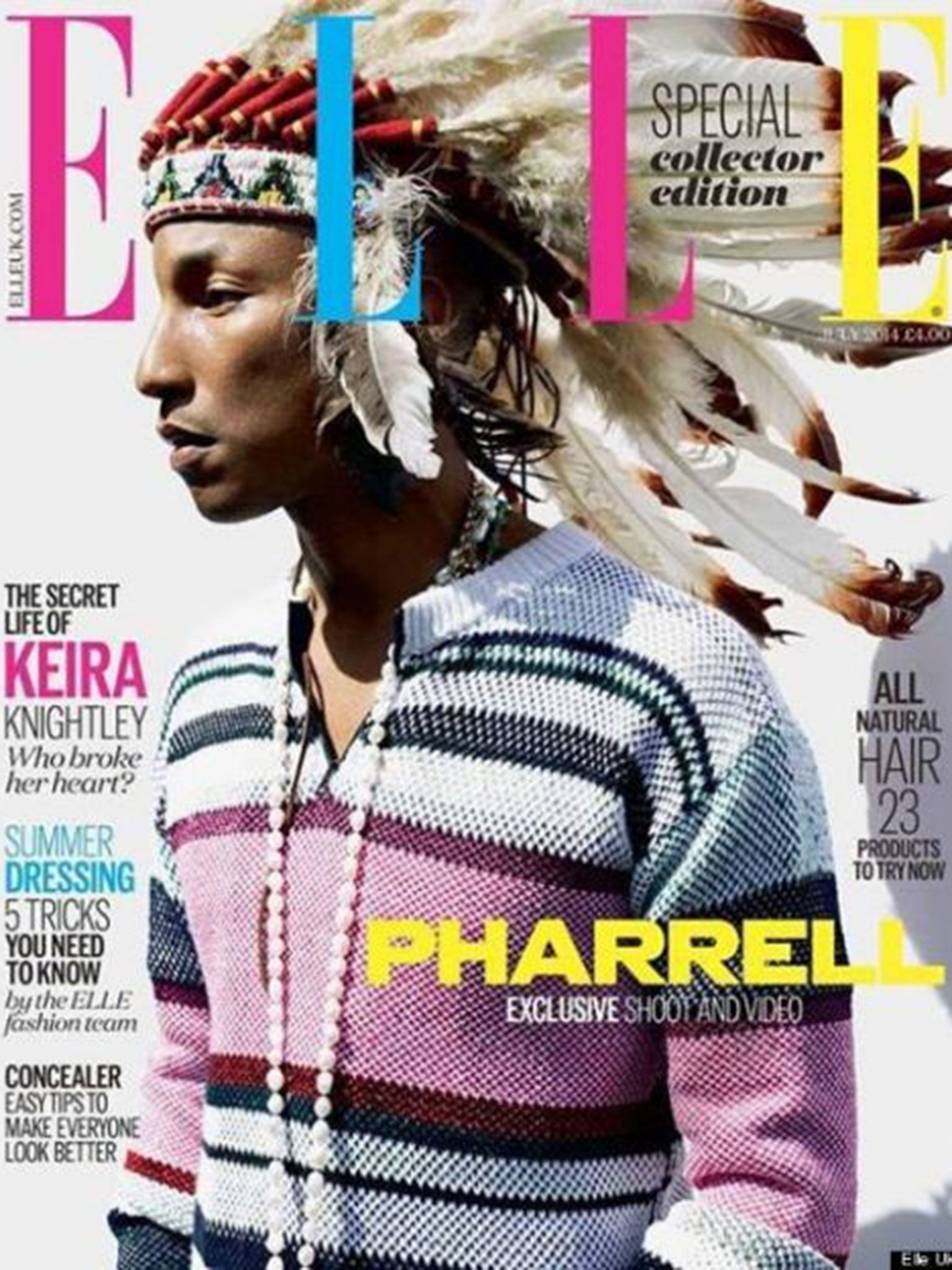 Pharrell Williams in a native American head-dress on the cover of Elle magazine