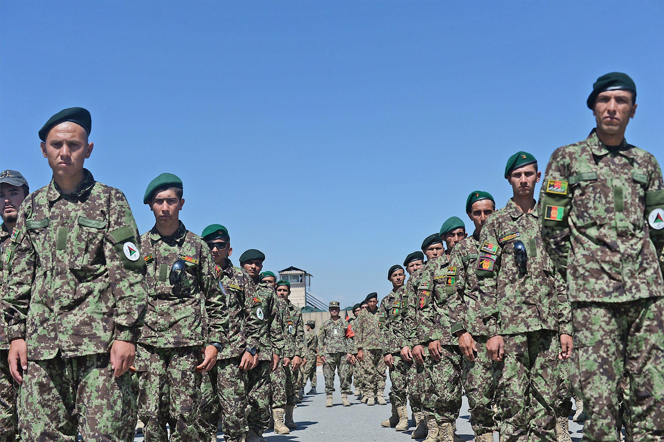 Afghan National Army troops; without US air support, forces lost much of their advantage over the Taliban and were hemmed in by mines (Getty)