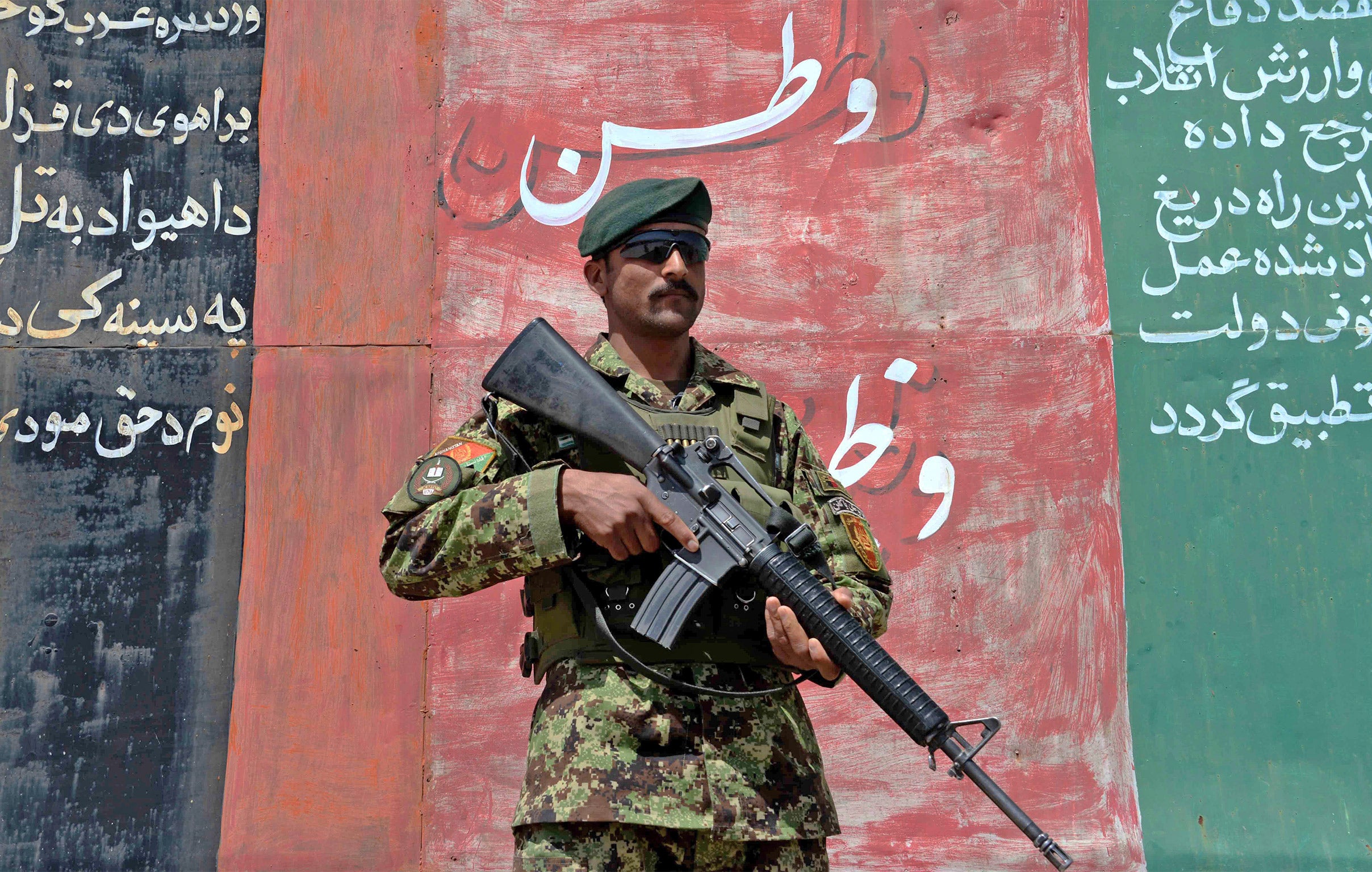 An Afghan National Army soldier looks on during a ceremony in Herat (Getty)