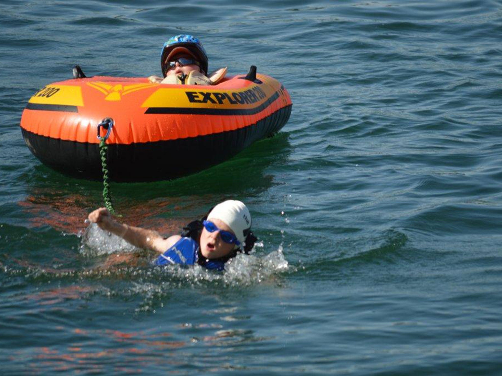 Noah pulled and pushed his disabled brother Lucas along the entire triathlon course