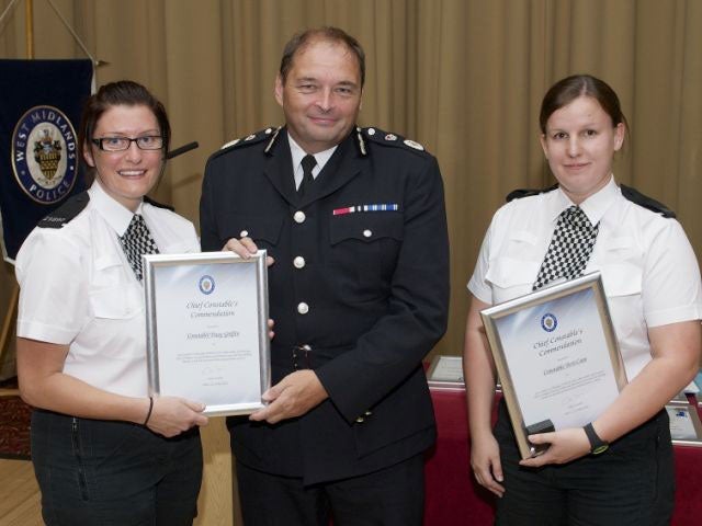 Tracy Griffin (left) and Terri Cave receiving their bravery commendations from Chief Constable Chris Sims