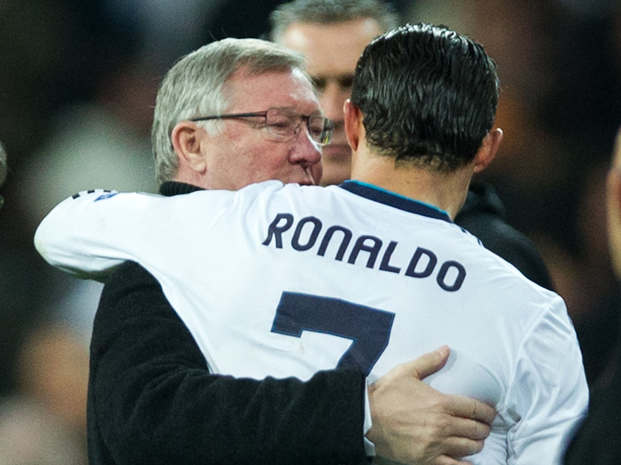 Ronaldo and Ferguson embrace after the first-leg of the Champions League meeting