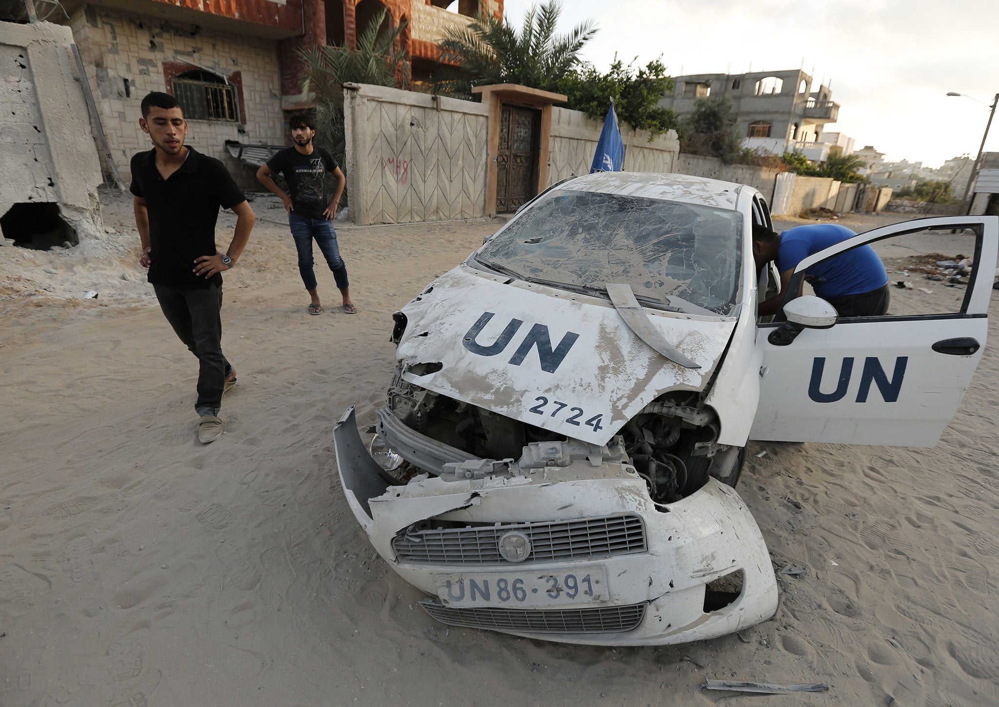 A destroyed UN vehicle is seen in Beit Lahia in the northern Gaza Strip on July 29, 2014 following Israeli military strikes.