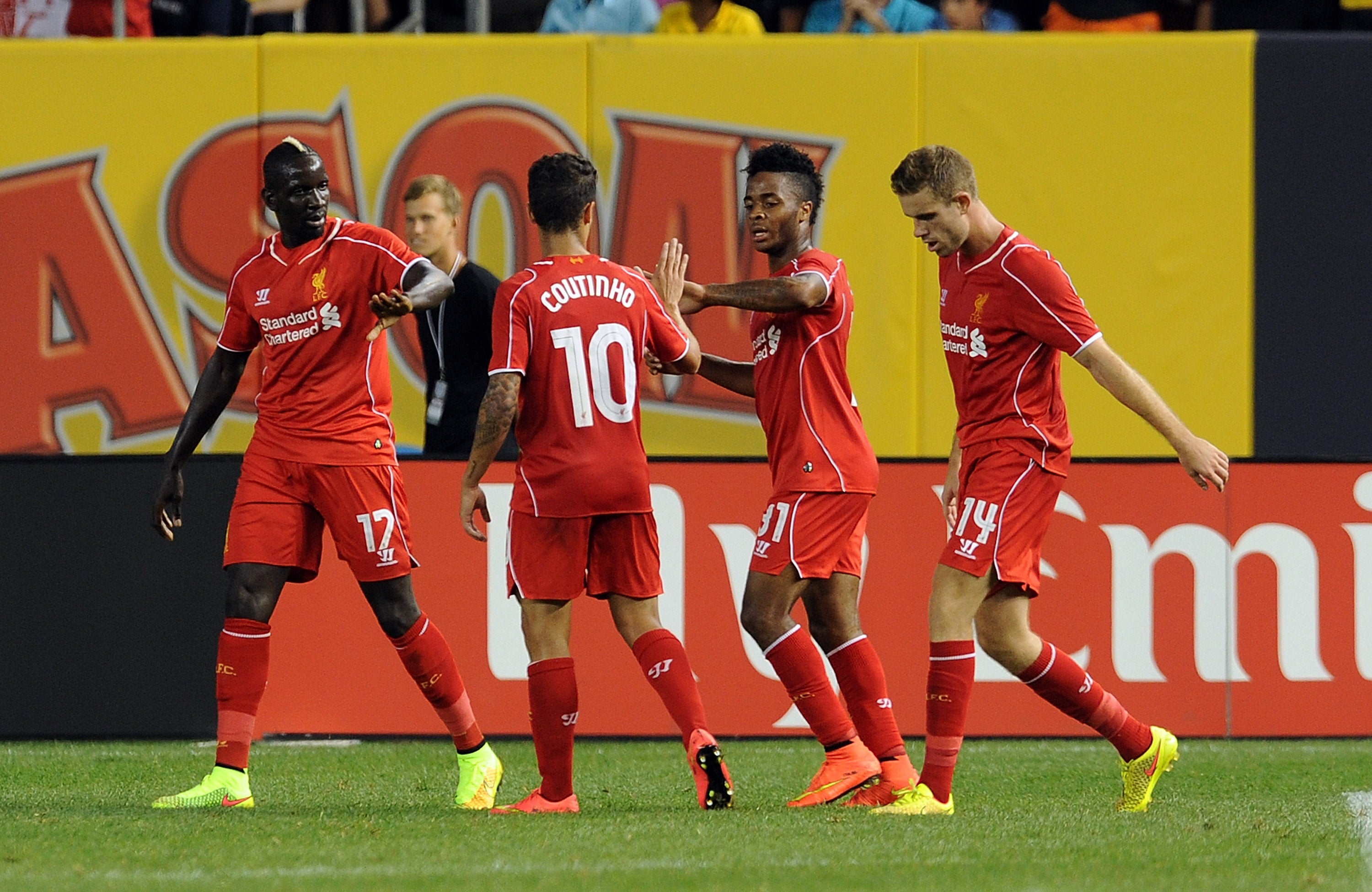 Raheem Sterling celebrates equalising for Liverpool against Manchester City in New York