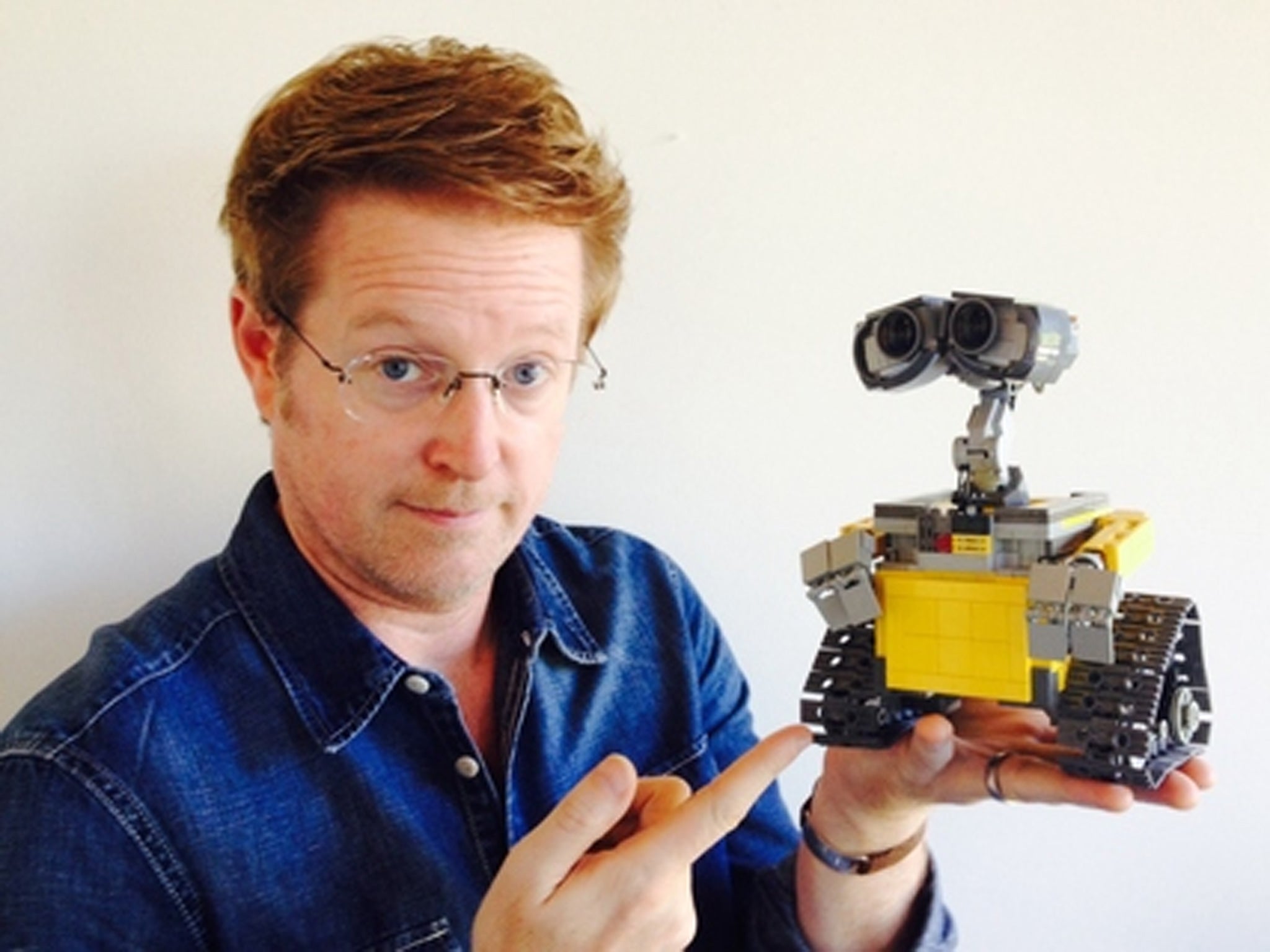 The director of Wall-E Andrew Stanton with Angus MacLane's Lego model