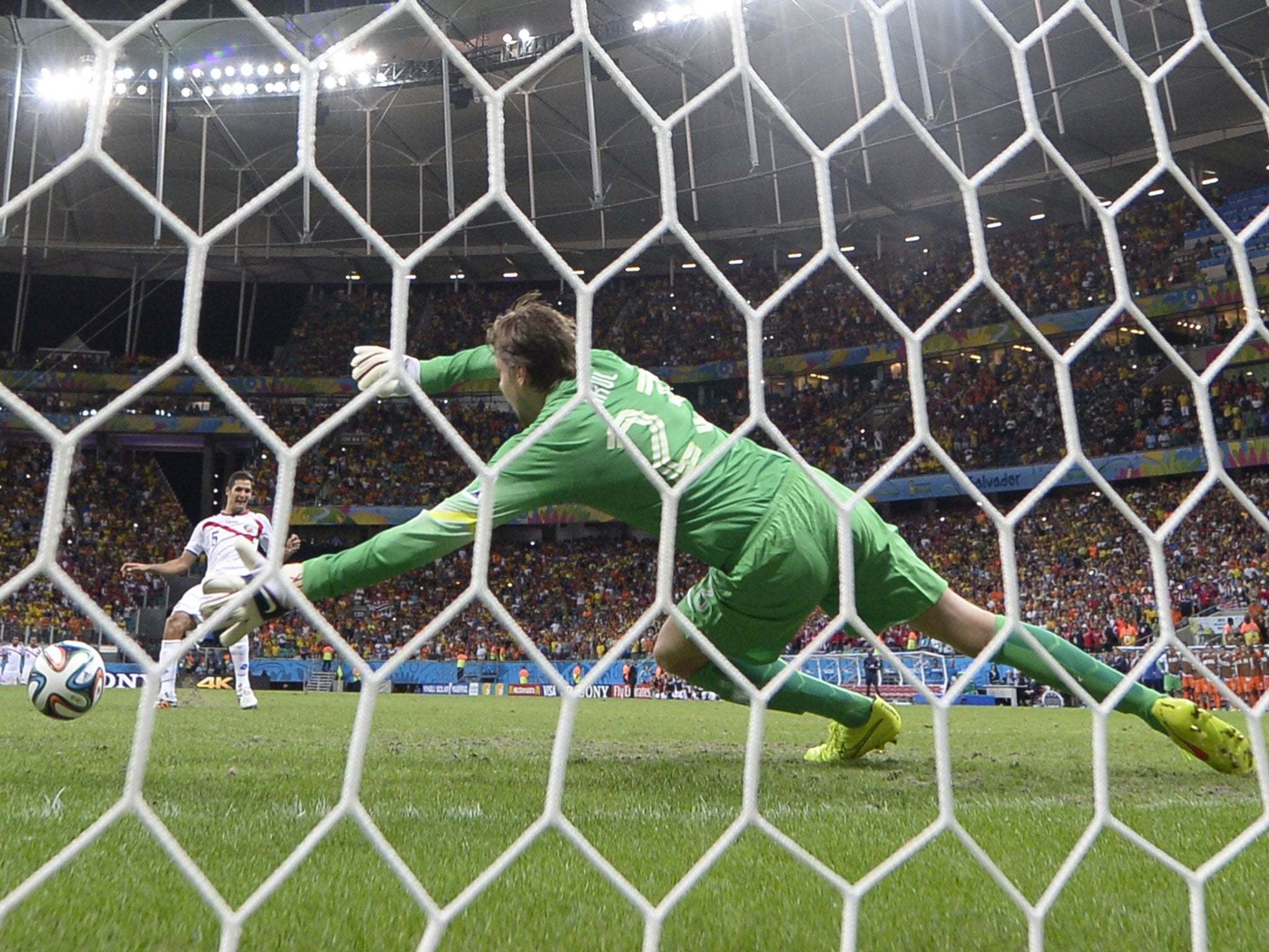 Netherlands' goalkeeper Tim Krul fails to make a save from Costa Rica's midfielder Celso Borges during a penalty shoot-out in the quarter-final between Netherlands and Costa Rica during the 2014 FIFA World Cup