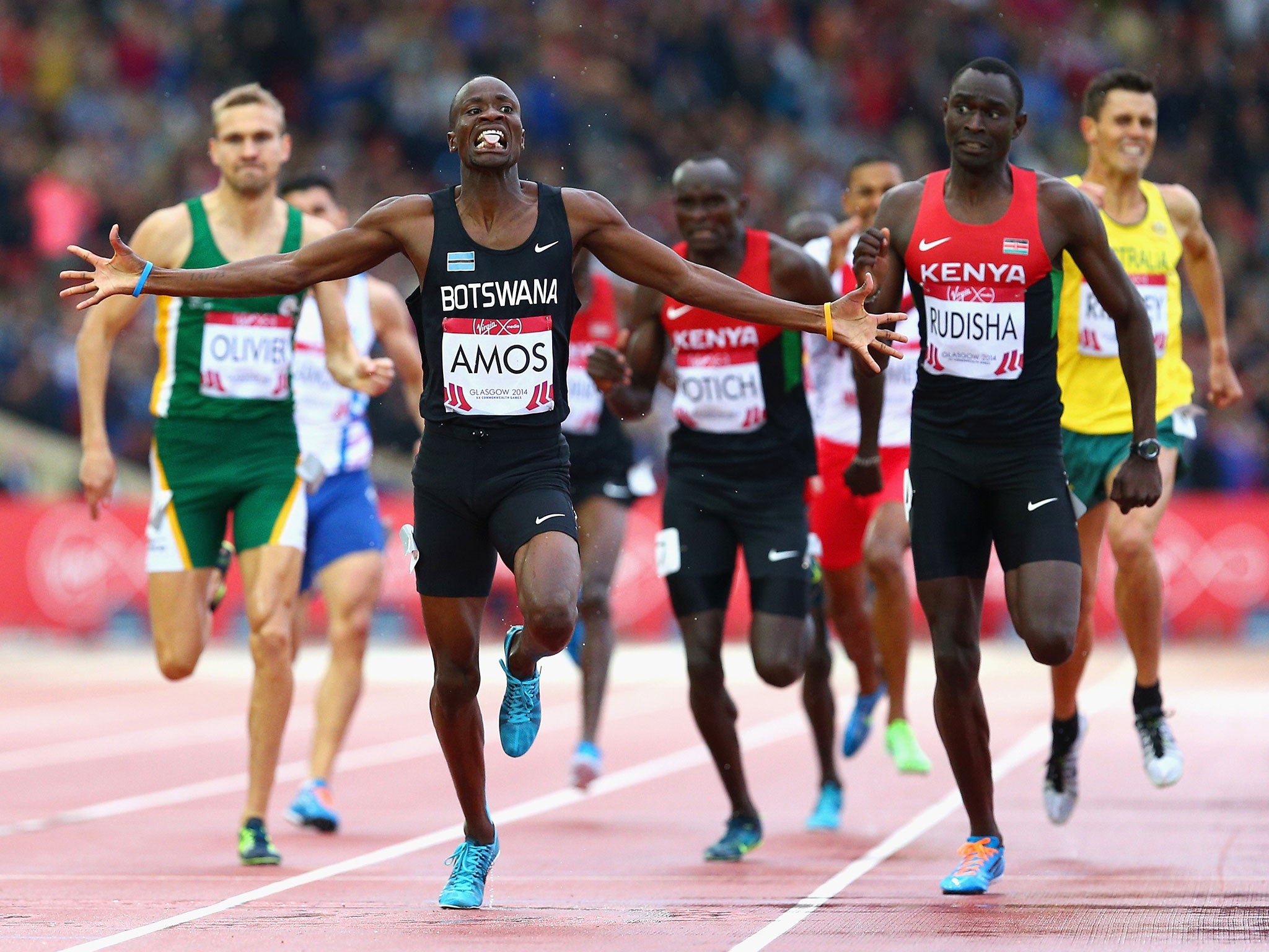 Nijel Amos crosses the line ahead of silver medallist David Rudisha, reversing their 2012 Olympic Games places