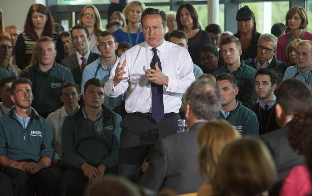 Cameron addresses a crowd at United Utilities