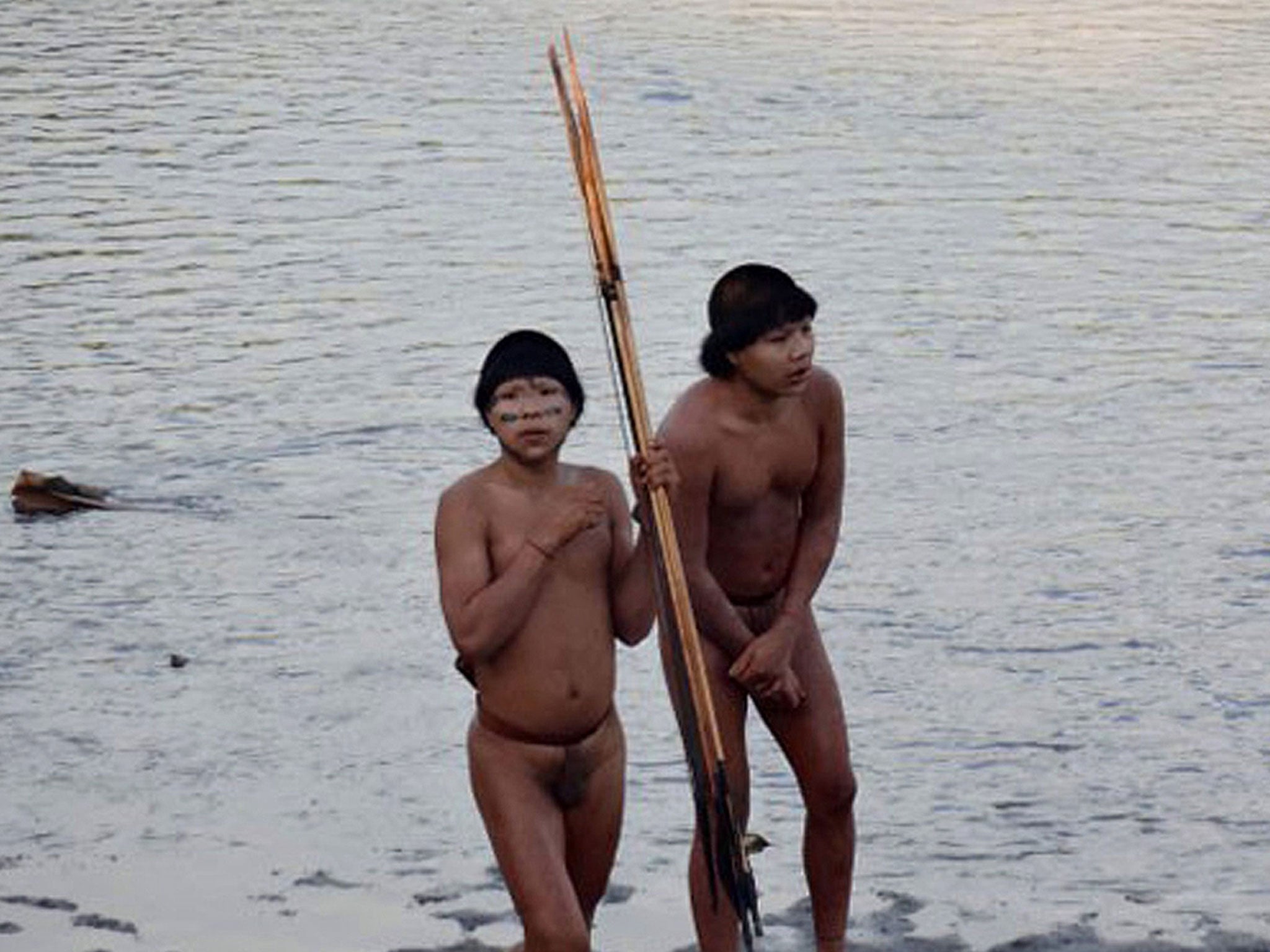 Isolated Amazonian indians make contact for the first time with Ashaninka natives on the banks of the Envira River, Brazil