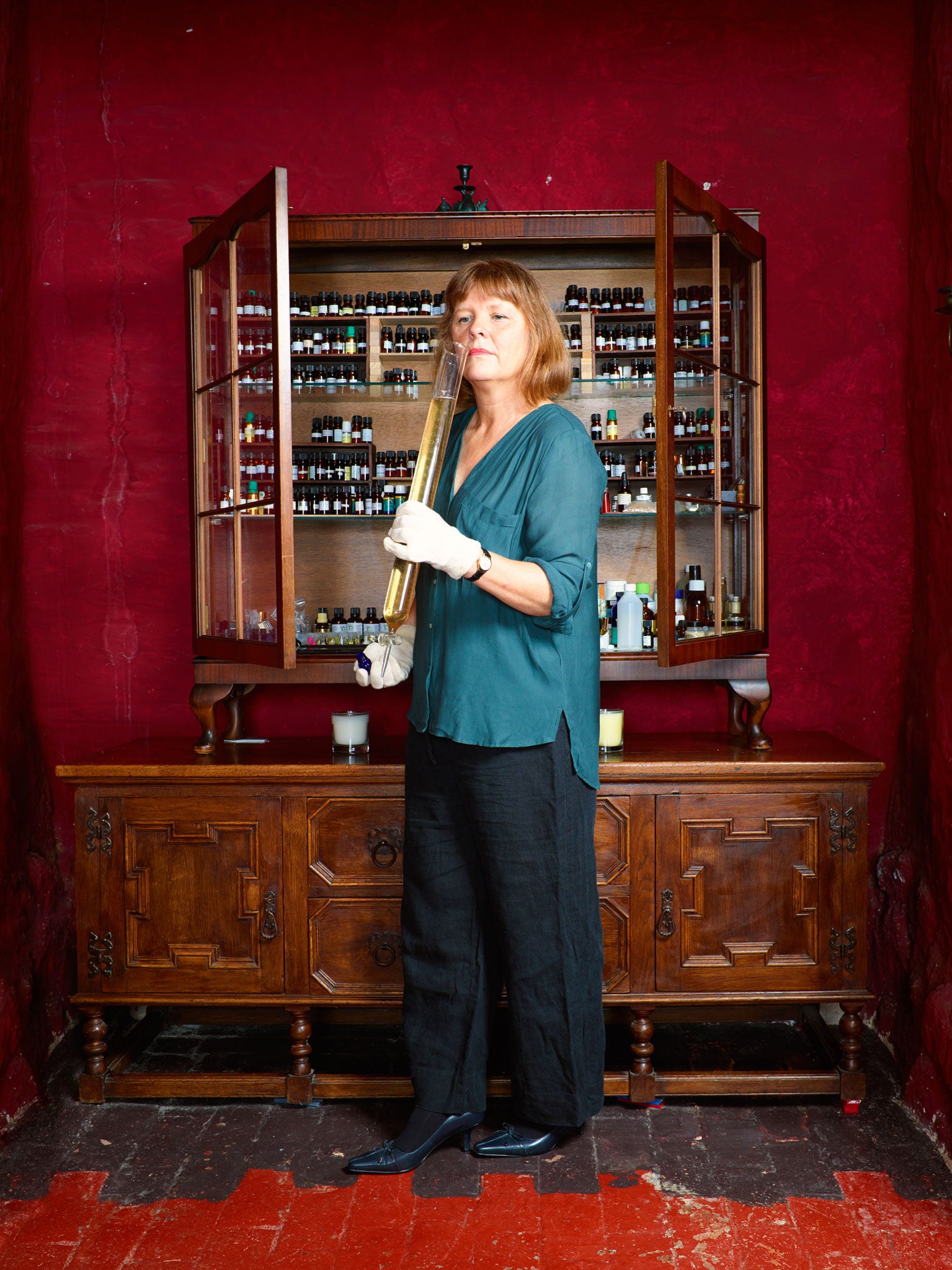 Amateur perfumer Fran Schofield in a dining room masquerading as a makeshift laboratory