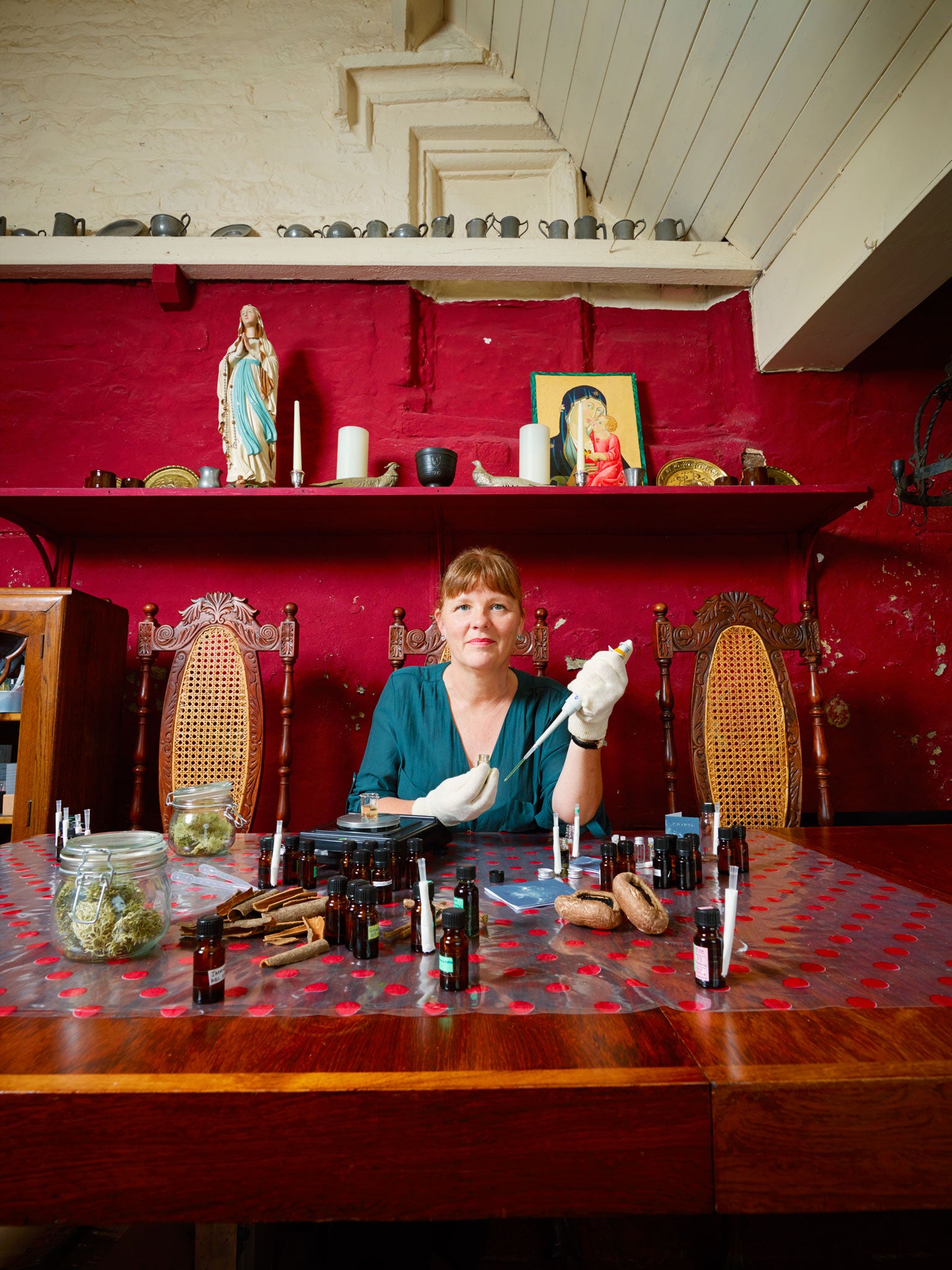 Fran Schofield in her makeshift laboratory, where she mixes materials 'robbed from nature', such as bee propolis