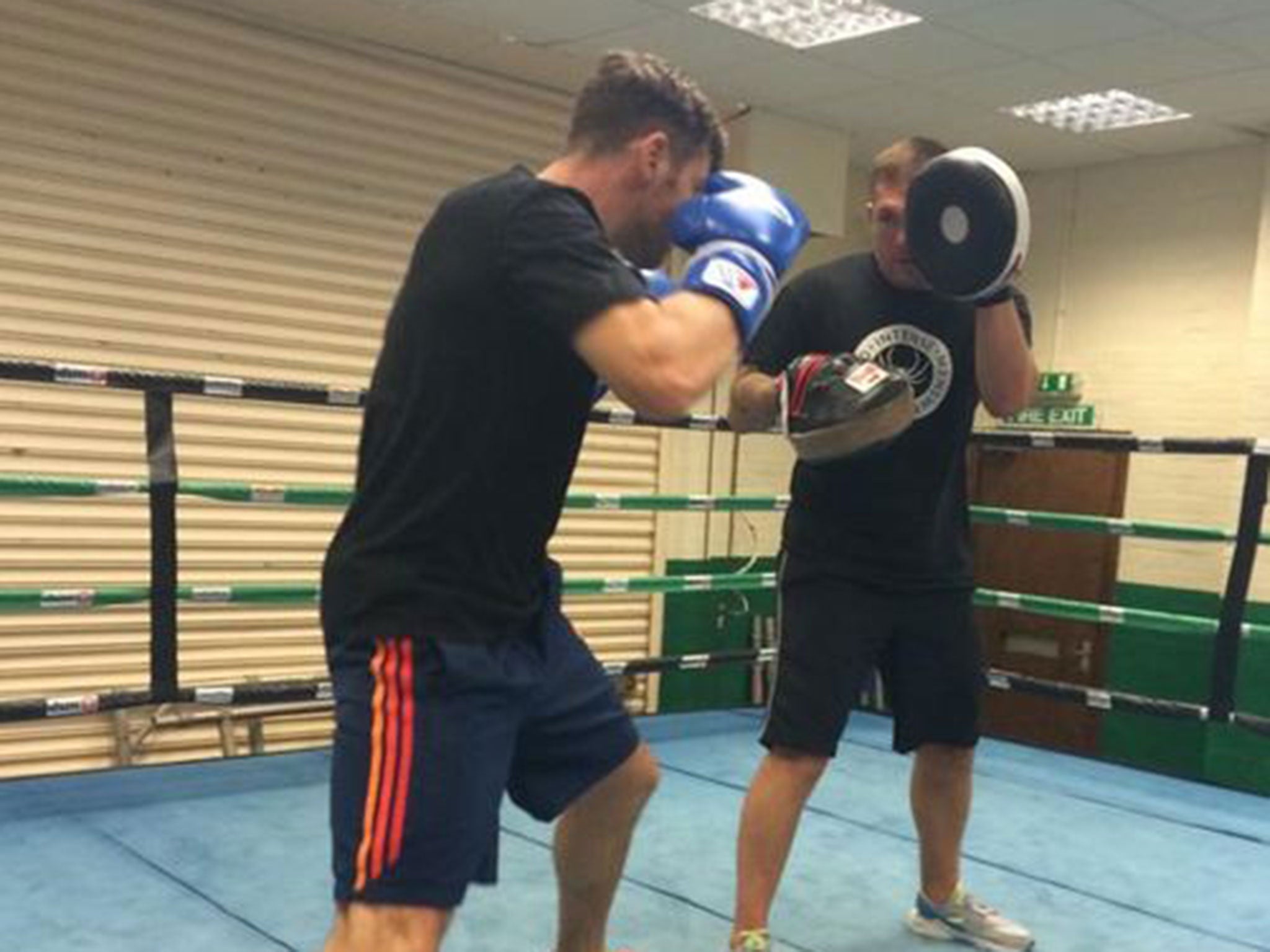 Macklin and Moore train in a photo taken from Moore's Twitter page