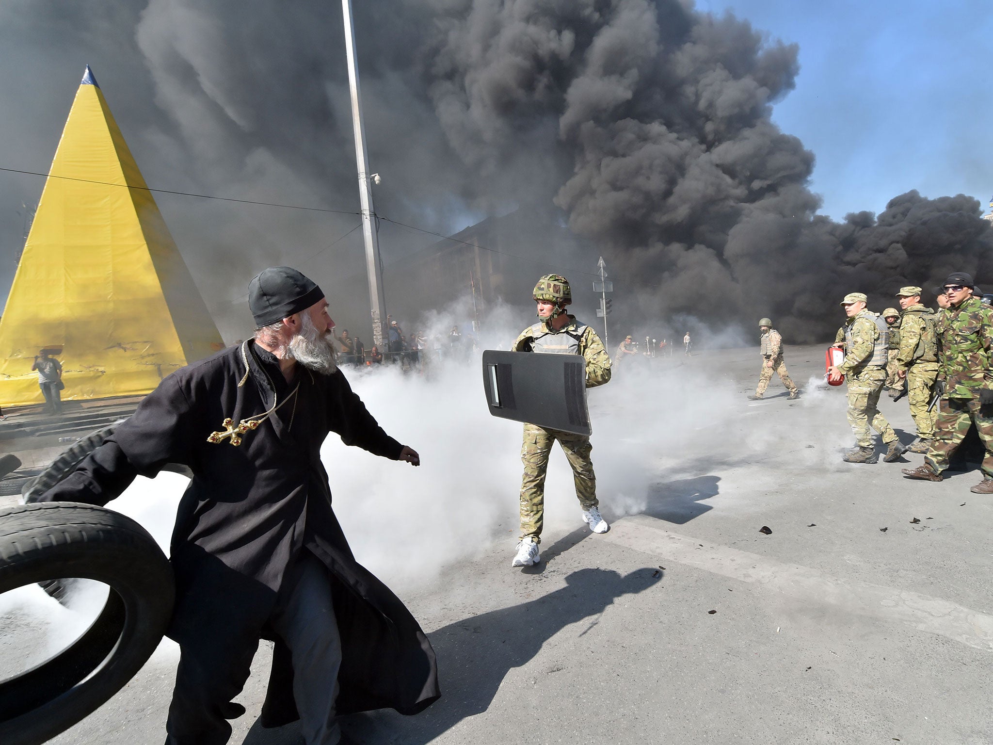 Clashes near the Maidan in central Kiev as troops tried to clear the streets of the remnants of an anti-Yanukovych protest camp