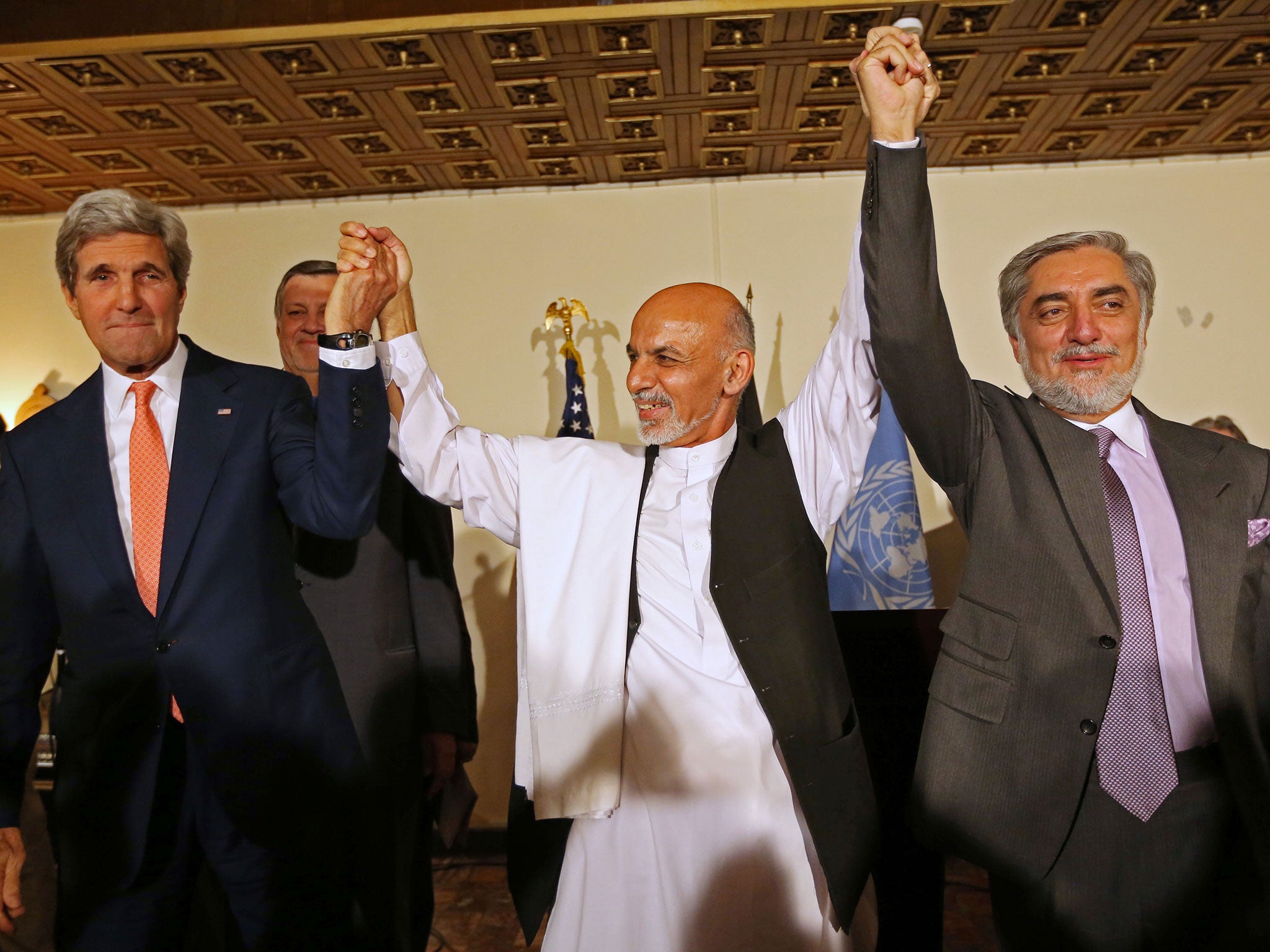 Secretary of State John Kerry with Afghanistan's presidential candidates Ashraf Ghani Ahmadzai (centre) and Abdullah Abdullah