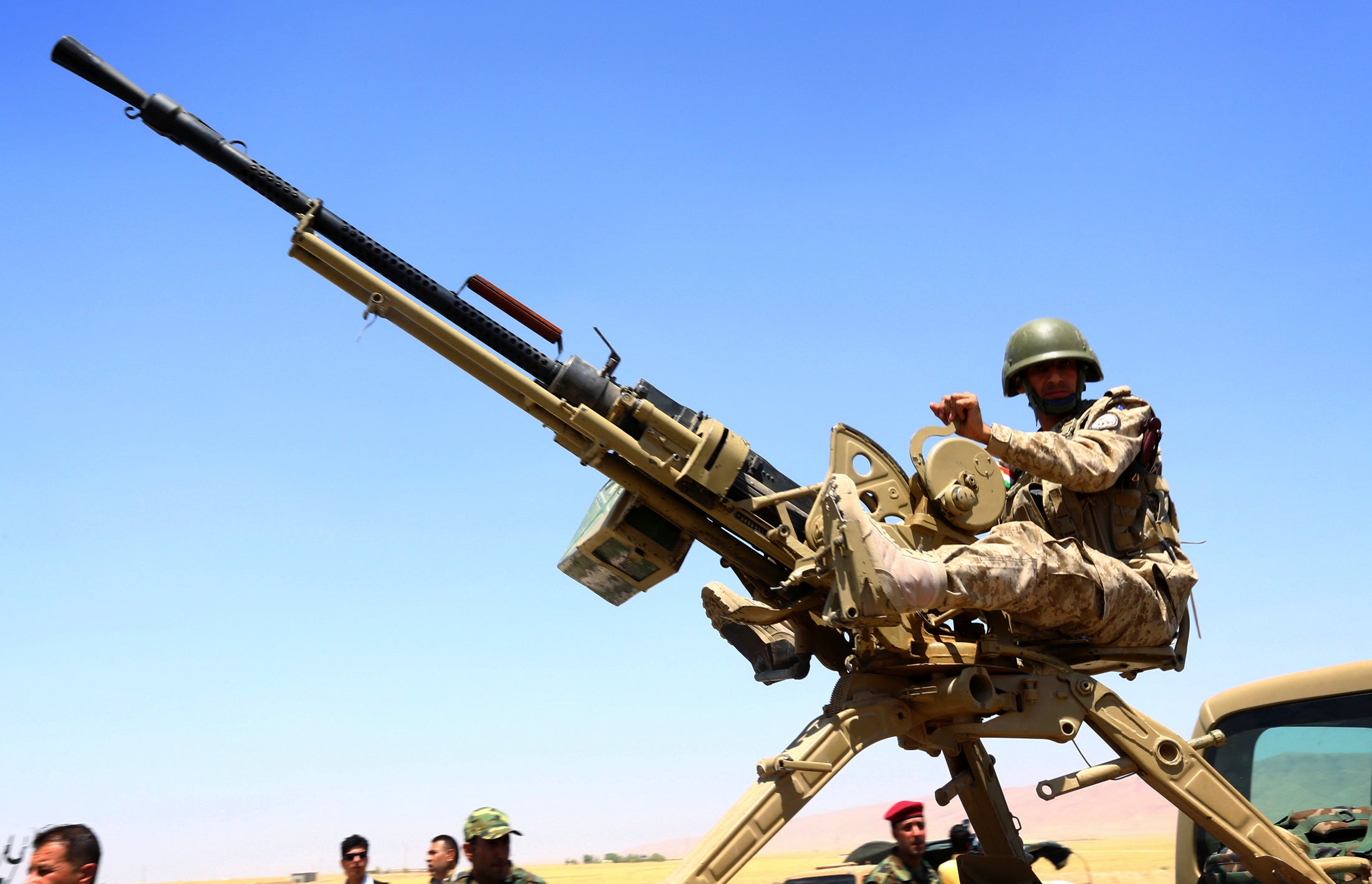 A member of the Kurdish Peshmerga, who are fighting Isis militants