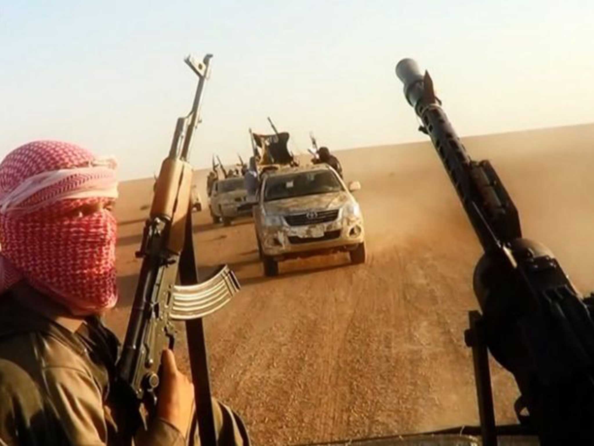 Militants on the march near Tikrit