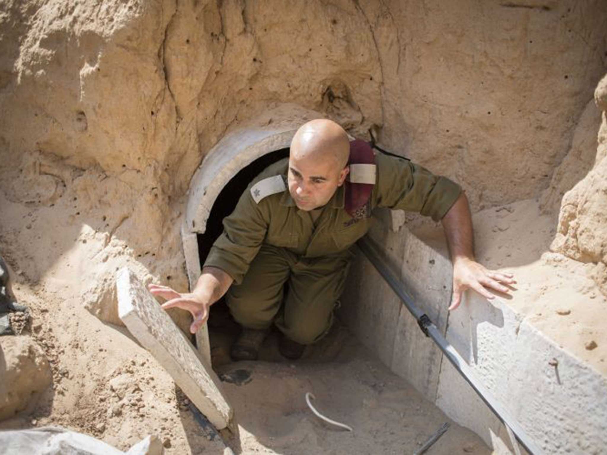 An IDF soldier exits one of the Hamas tunnels running from Gaza into Israel