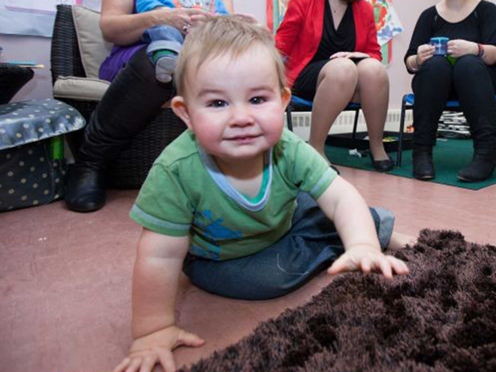 Labour’s Lucy Powell MP talks to mothers at a Sure Start centre in Manchester