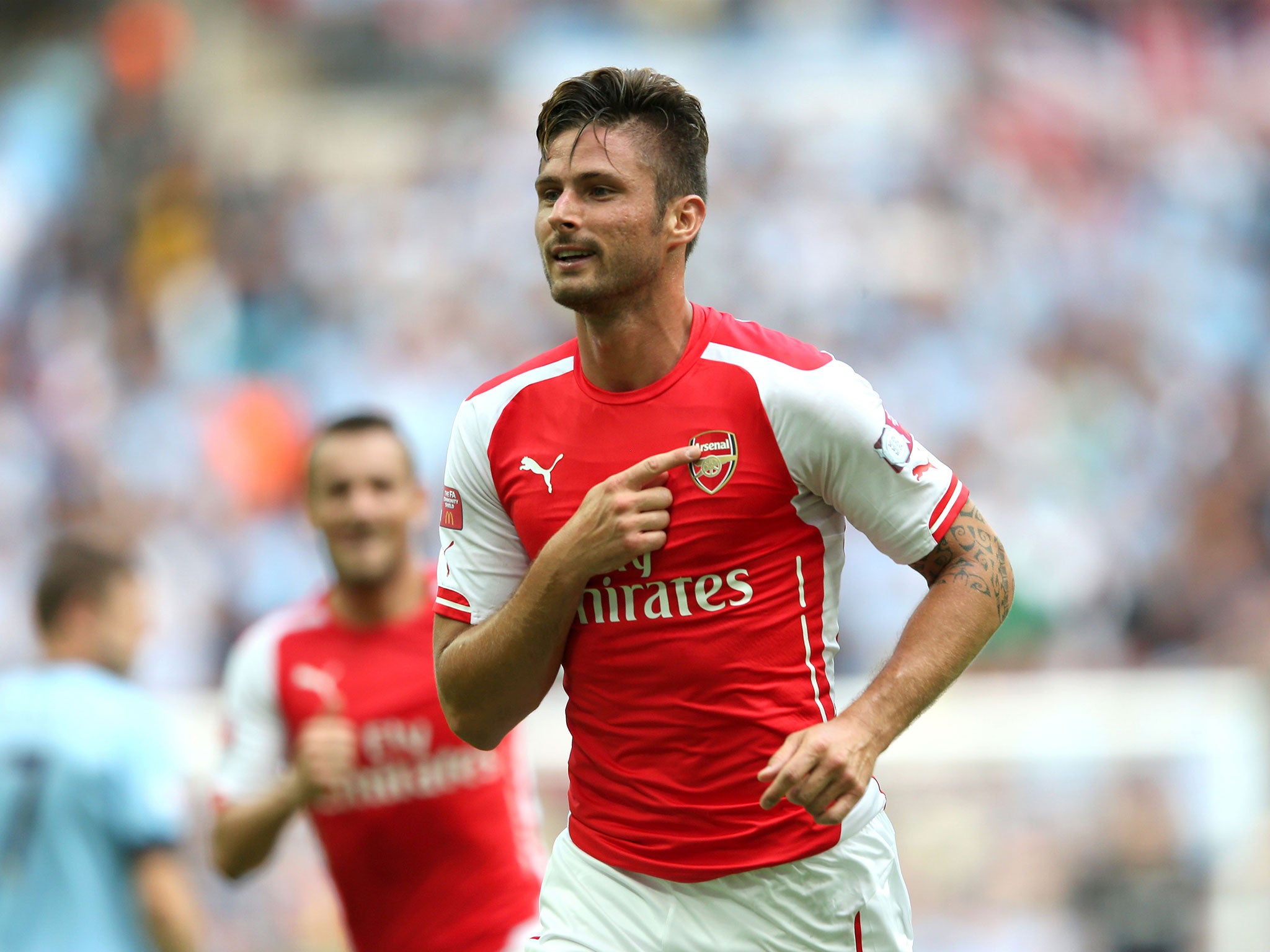 Olivier Giroud celebrates his strike