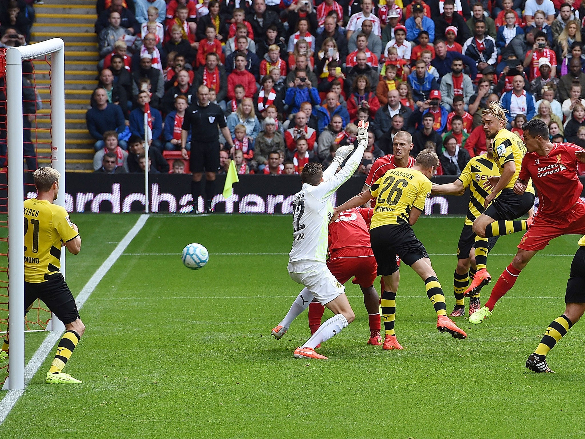 Dejan Lovren heads in his goal against Borussia Dortmund