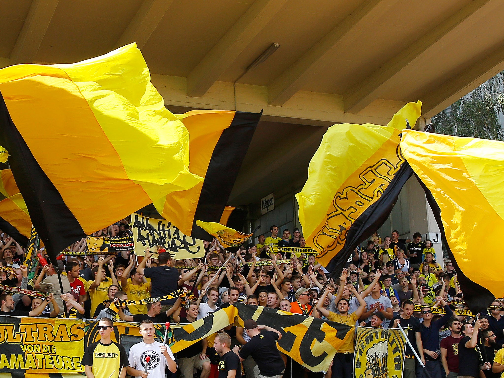 Borussia Dortmund fans joined in with Liverpool supporters to sing You'll Never Walk Alone