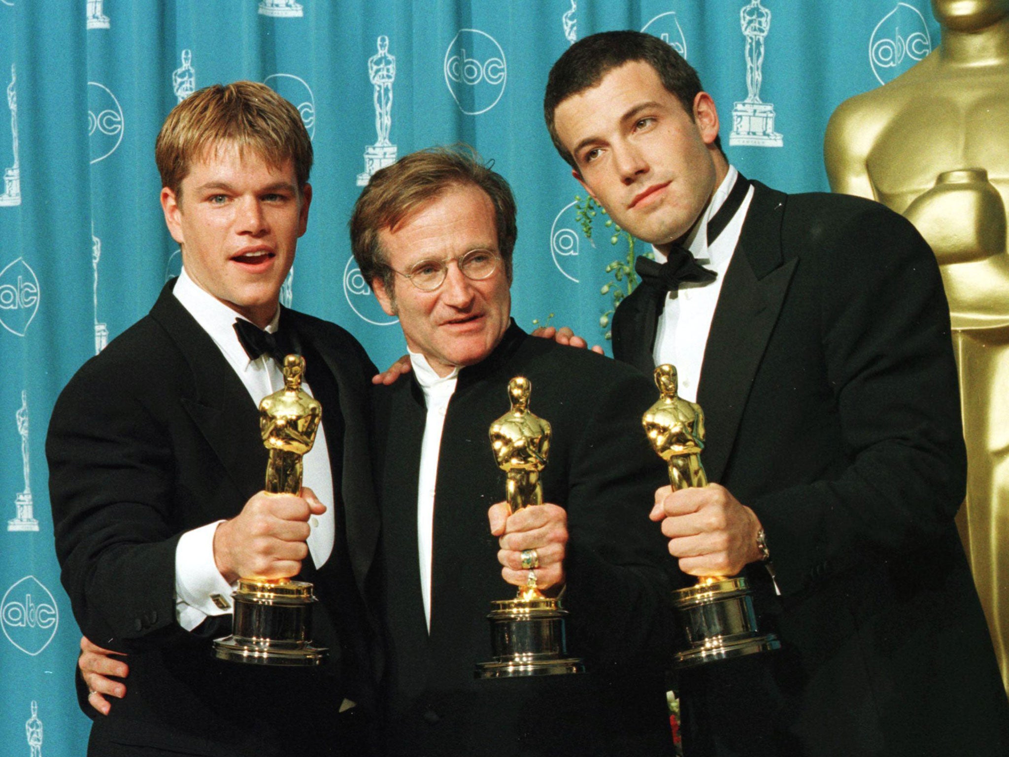 Williams with his 'Good Will Hunting' co-stars Matt Damon and Ben Affleck at the 1998 Oscars