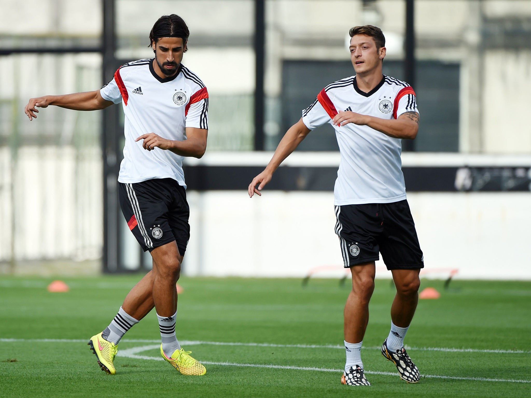 Sami Khedira with Mesut Ozil