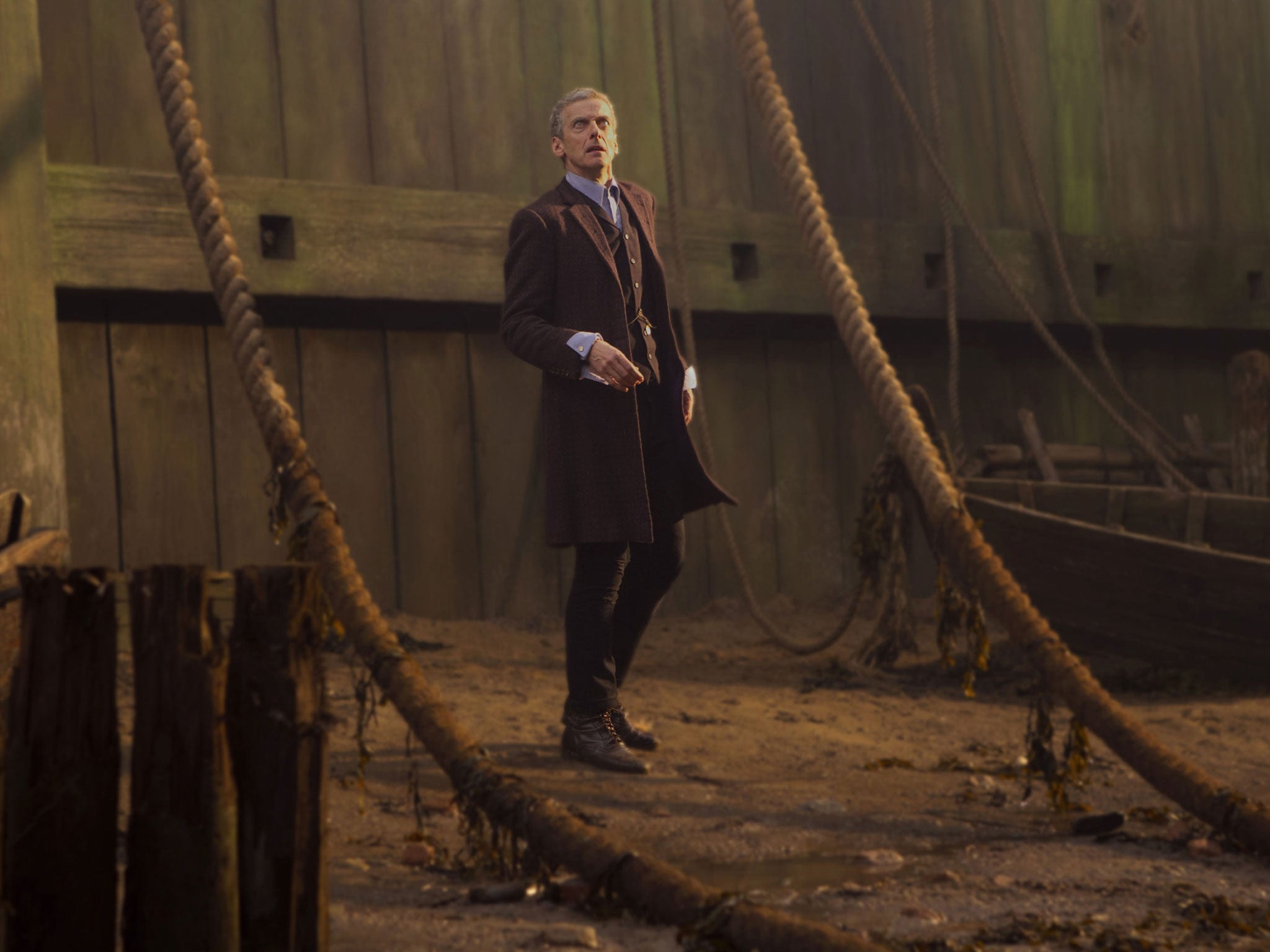 The Doctor on the banks of the Thames stares up at the creature that has been terrorising Londoners in 'Deep Breath'