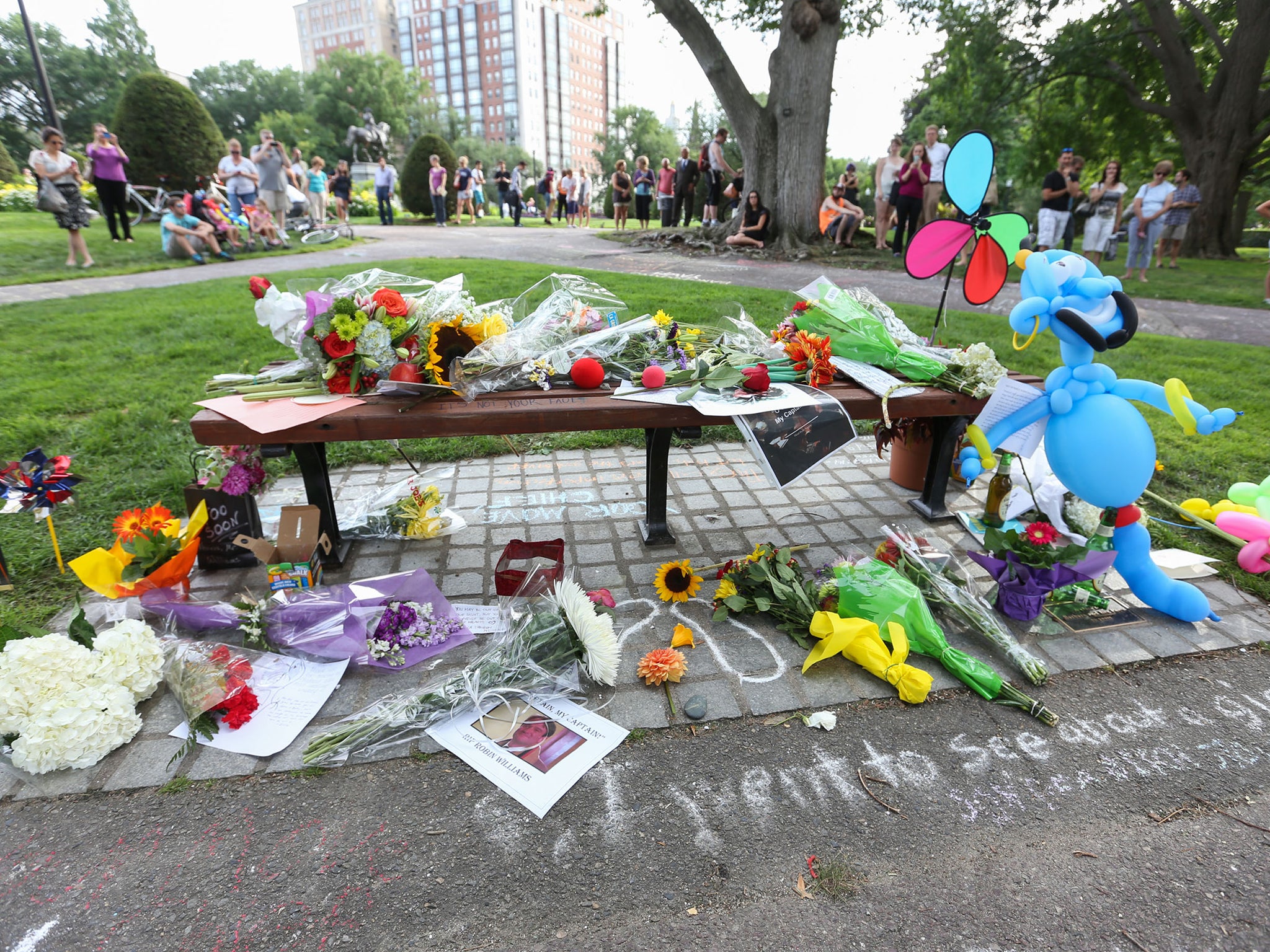 Flowers, quotes and a Genie were left on the Boston bench