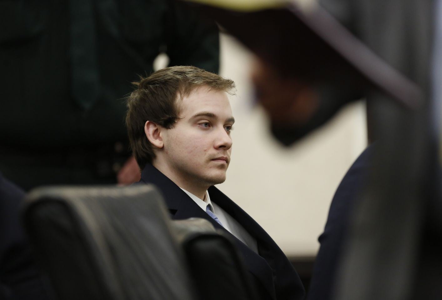 Pedro Bravo sits in a courtroom in the Alachua County Criminal Justice Center in Gainesville, Fla. for his murder trial on Tuesday, Aug. 5, 2014.