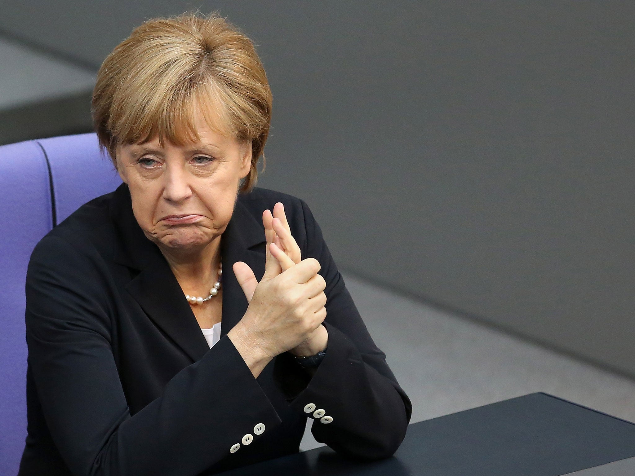 German Chancellor Angela Merkel attends a meeting of the Bundestag, Germany's federal parliament