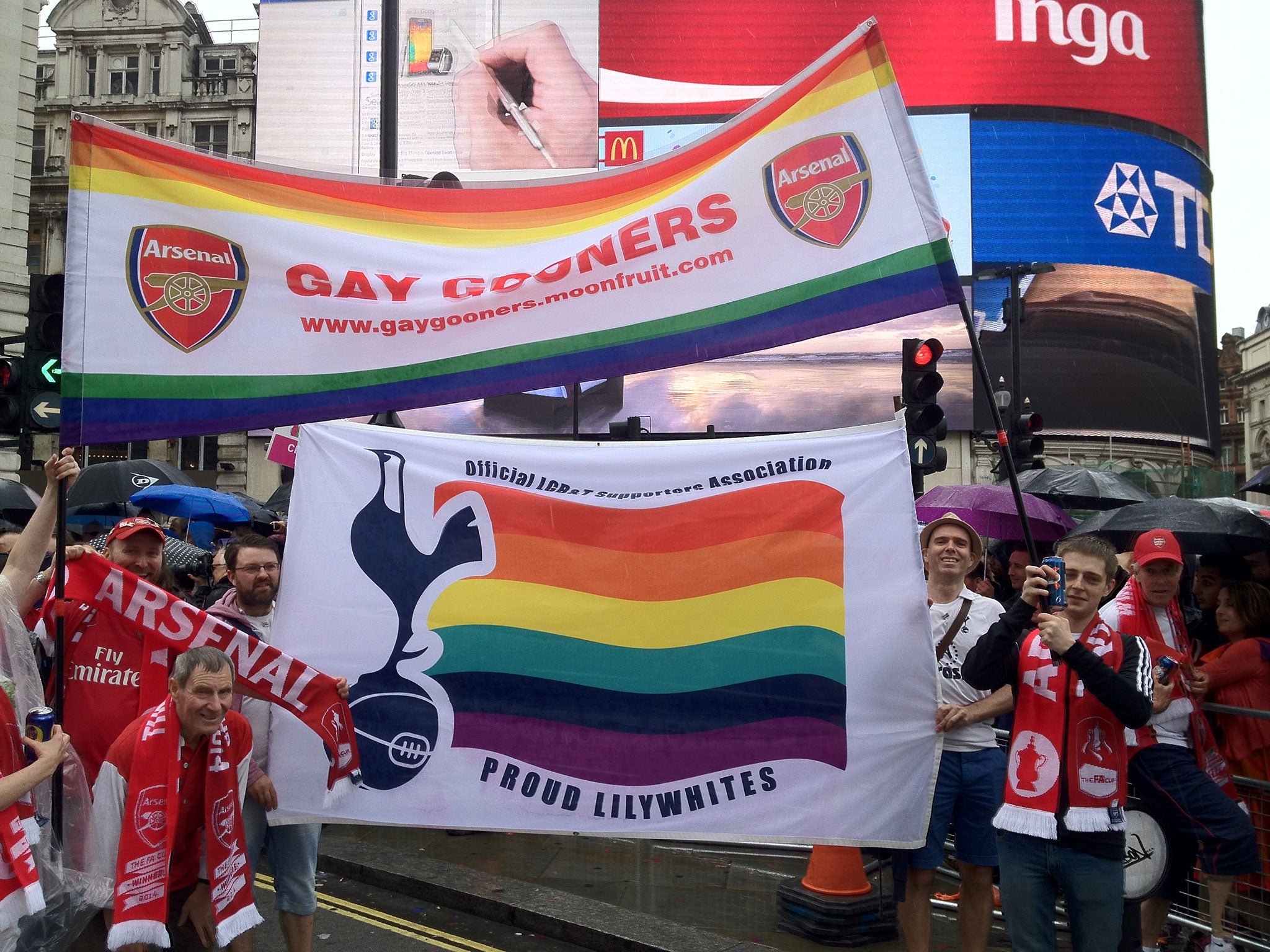 You'll never walk alone: LGBT football fans show their colours during London Pride this year