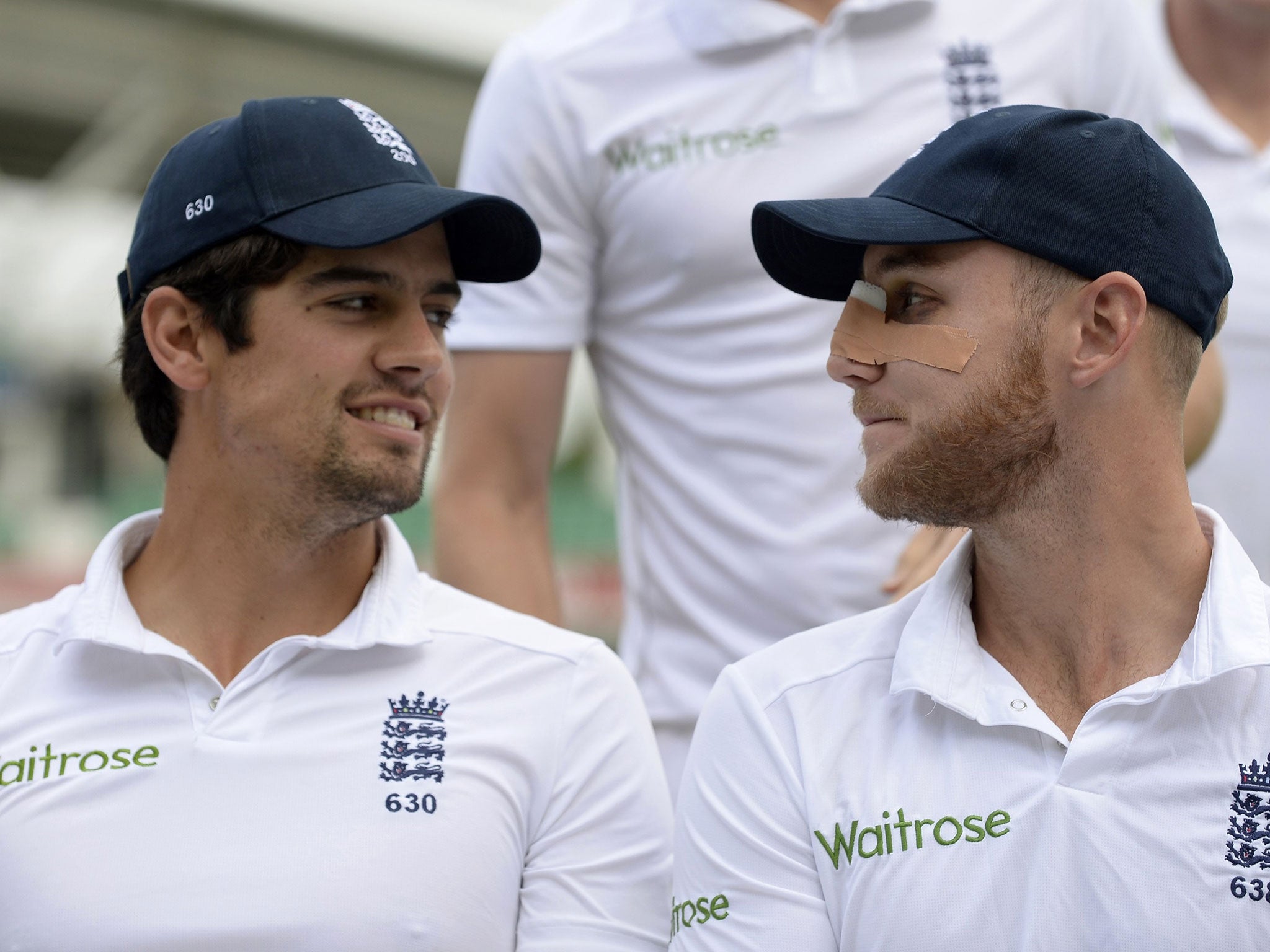 Alastair Cook and a bandaged Stuart Broad reminisce