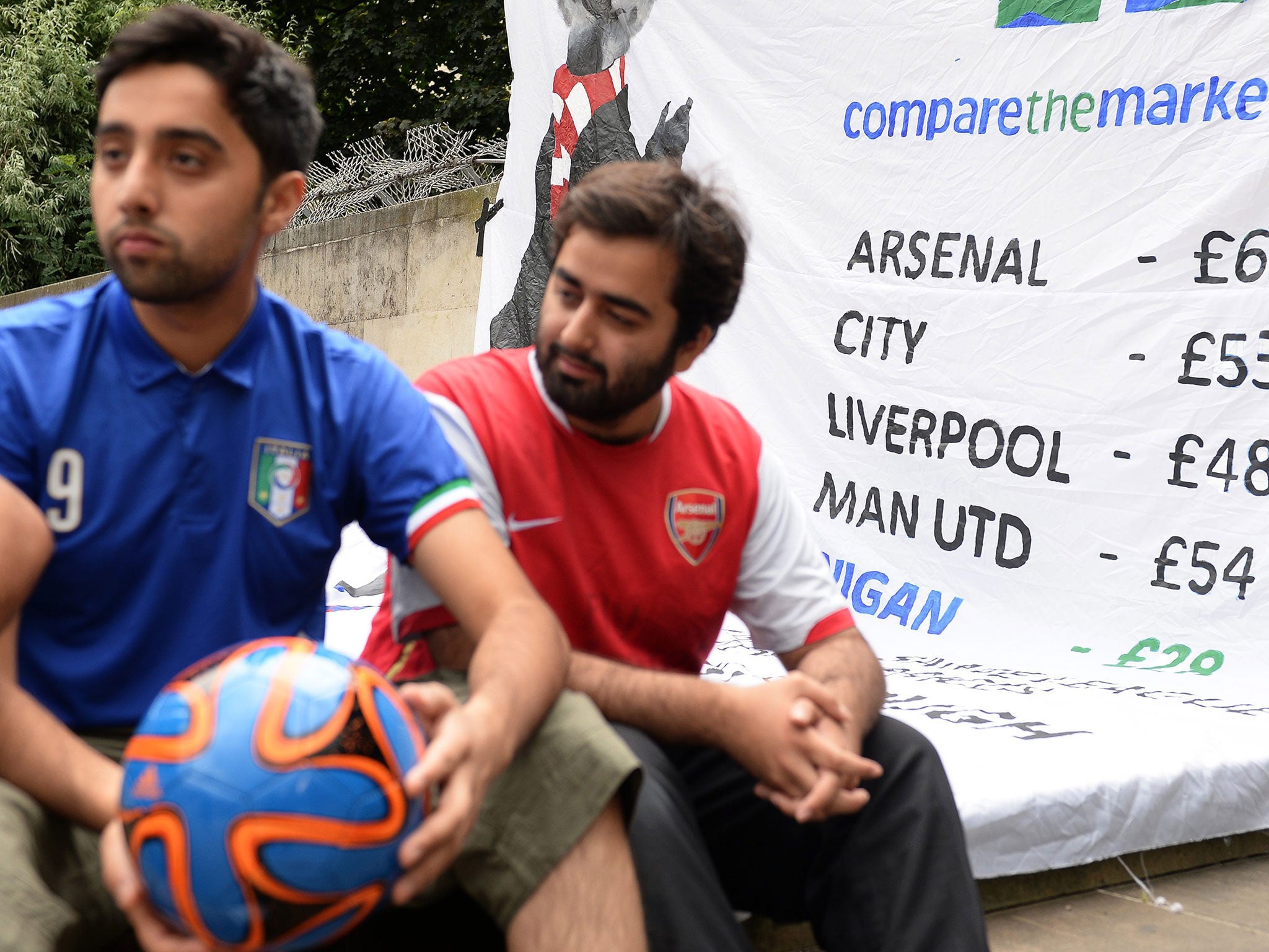 Supporters marched on the headquarters of the Premier League and the Football League to protest against the rising cost of tickets