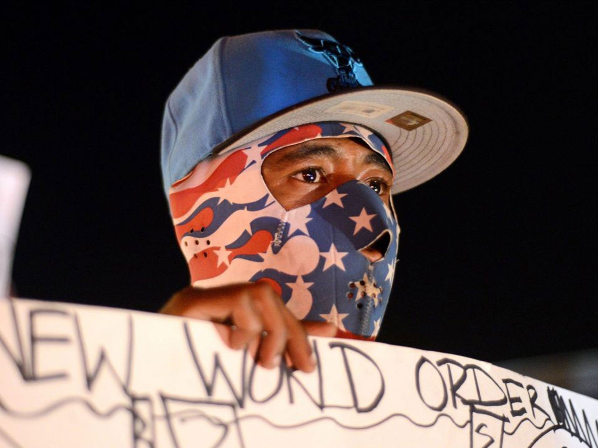 Protesters gather in Ferguson following the shooting of Michael Brown