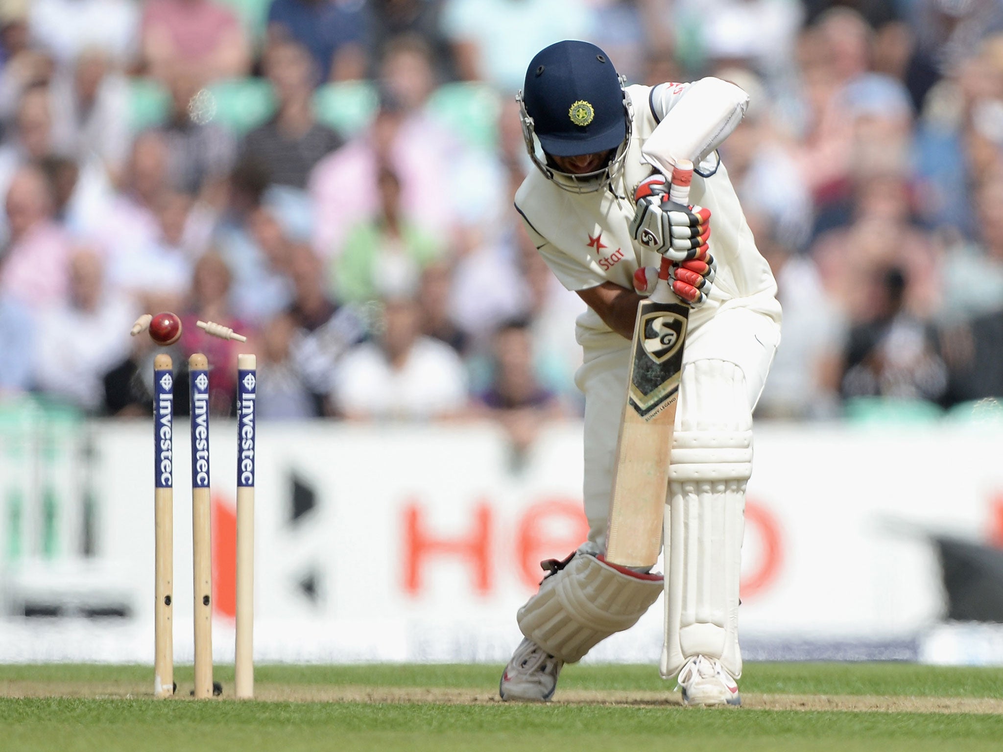 Stuart Broad gets the wicket of Cheteshwar Pujara