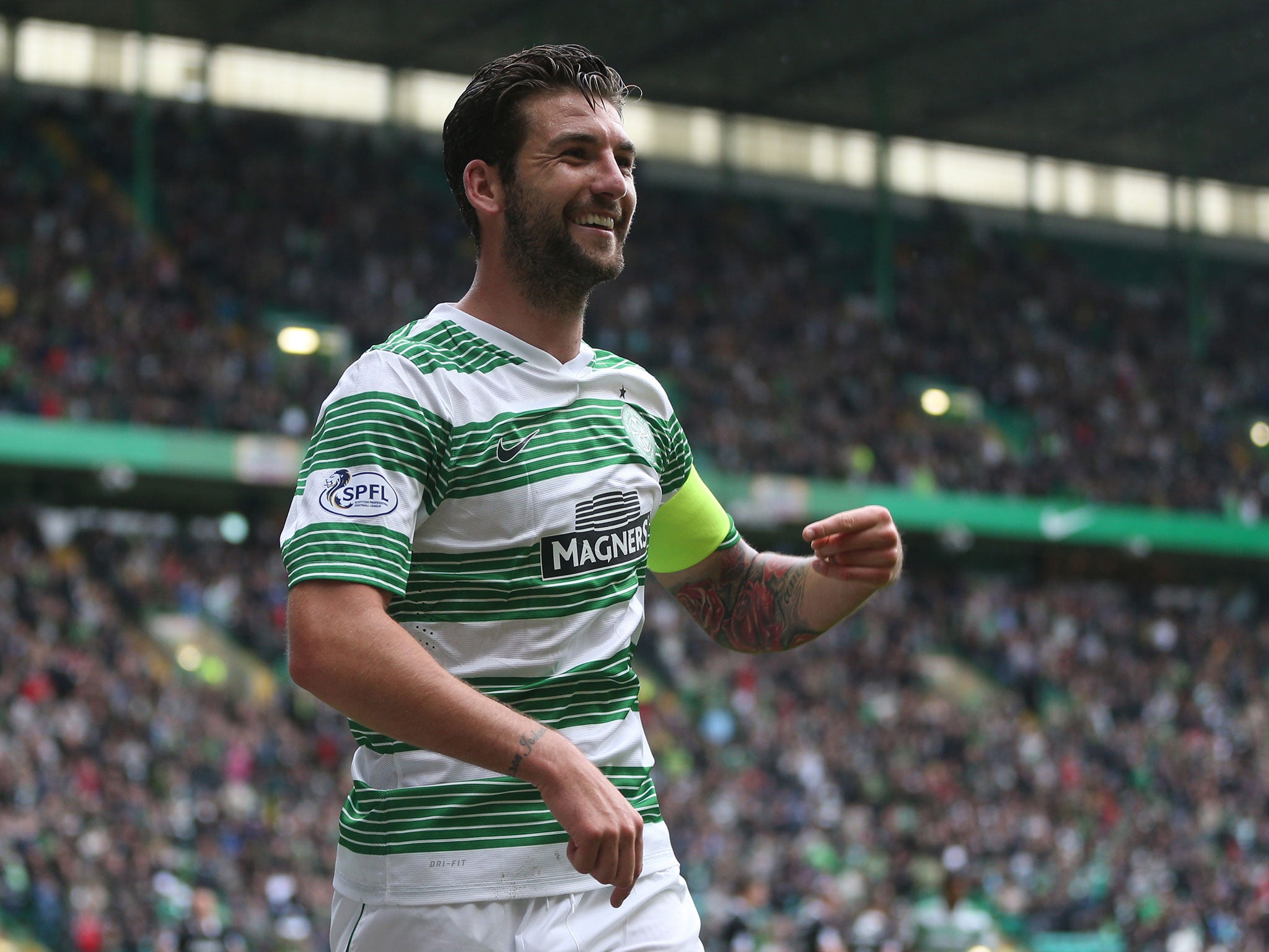 Charlie Mulgrew celebrates scoring for Celtic in the 6-1 thrashing of Dundee United