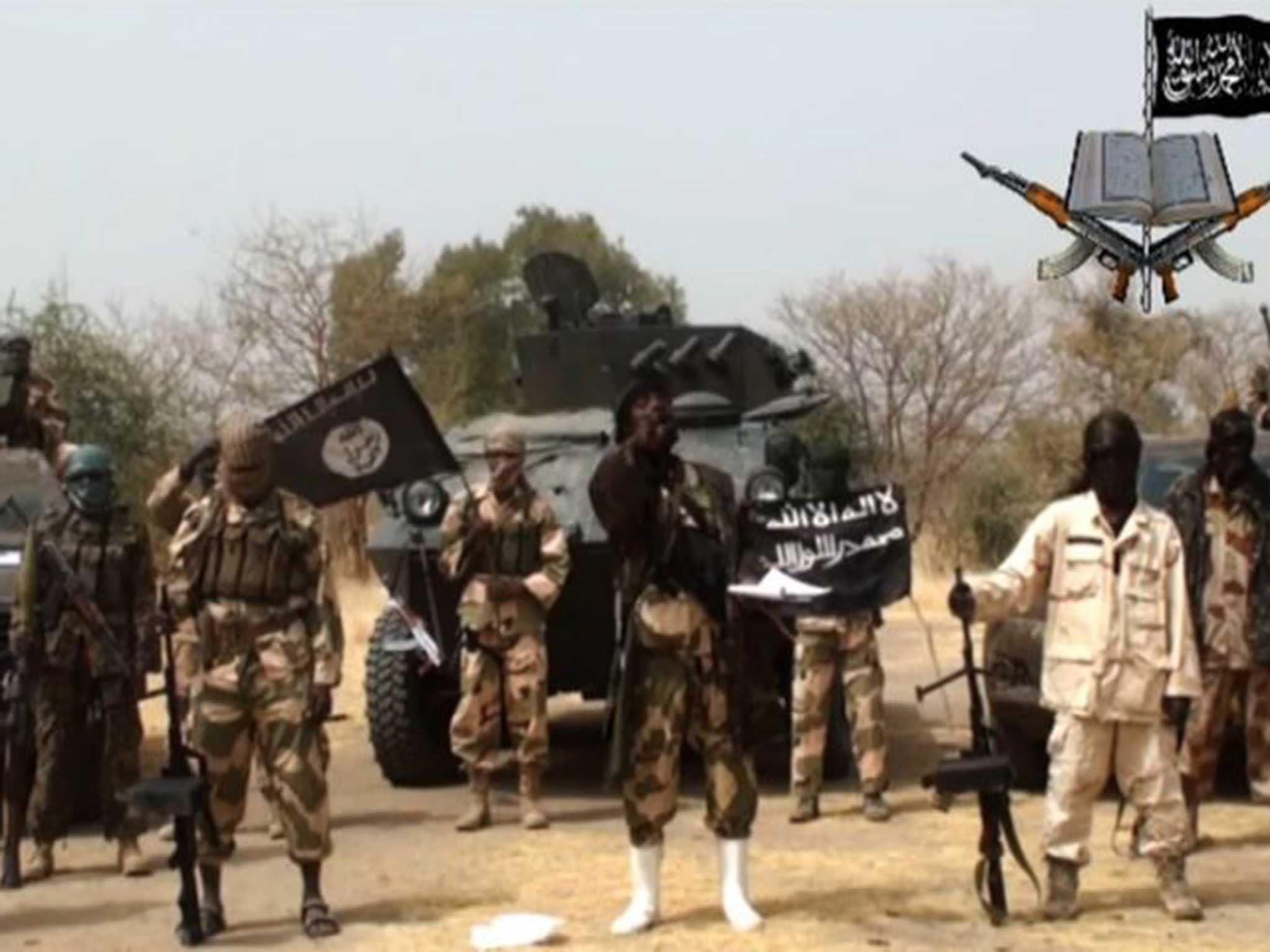 Boko Haram, pictured here in a still from one of their previous videos, have reportedly freed 27 hostages in Cameroon