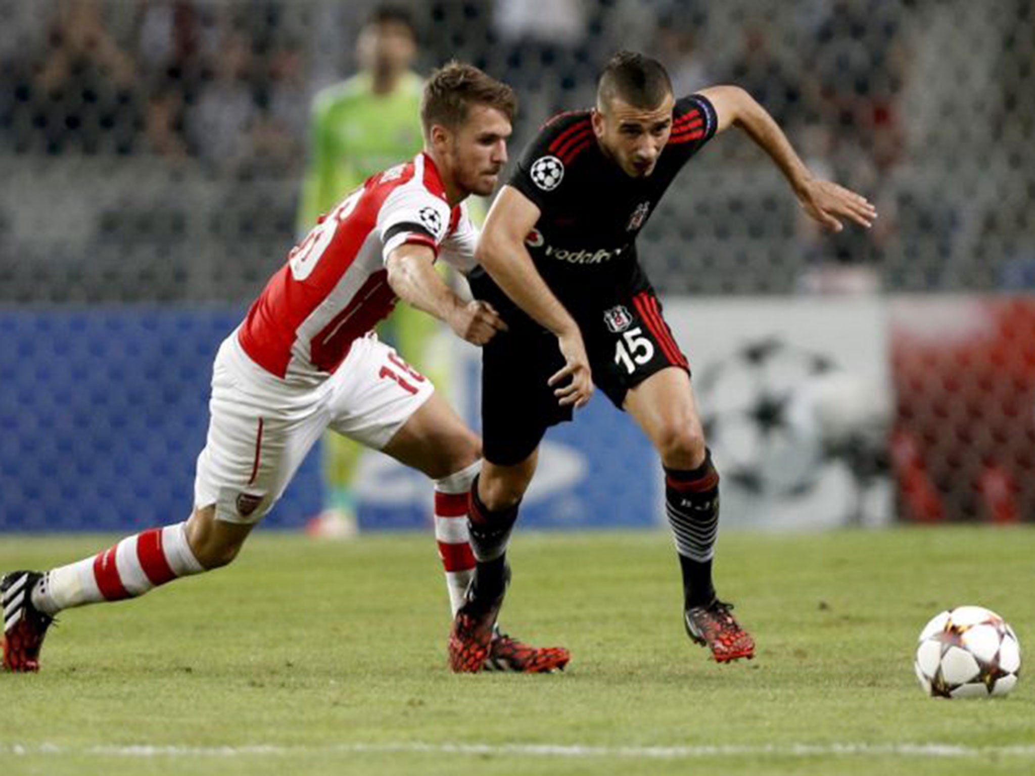 Aaron Ramsey pulls back Oguzhan Ozyakup to earn his second yellow card