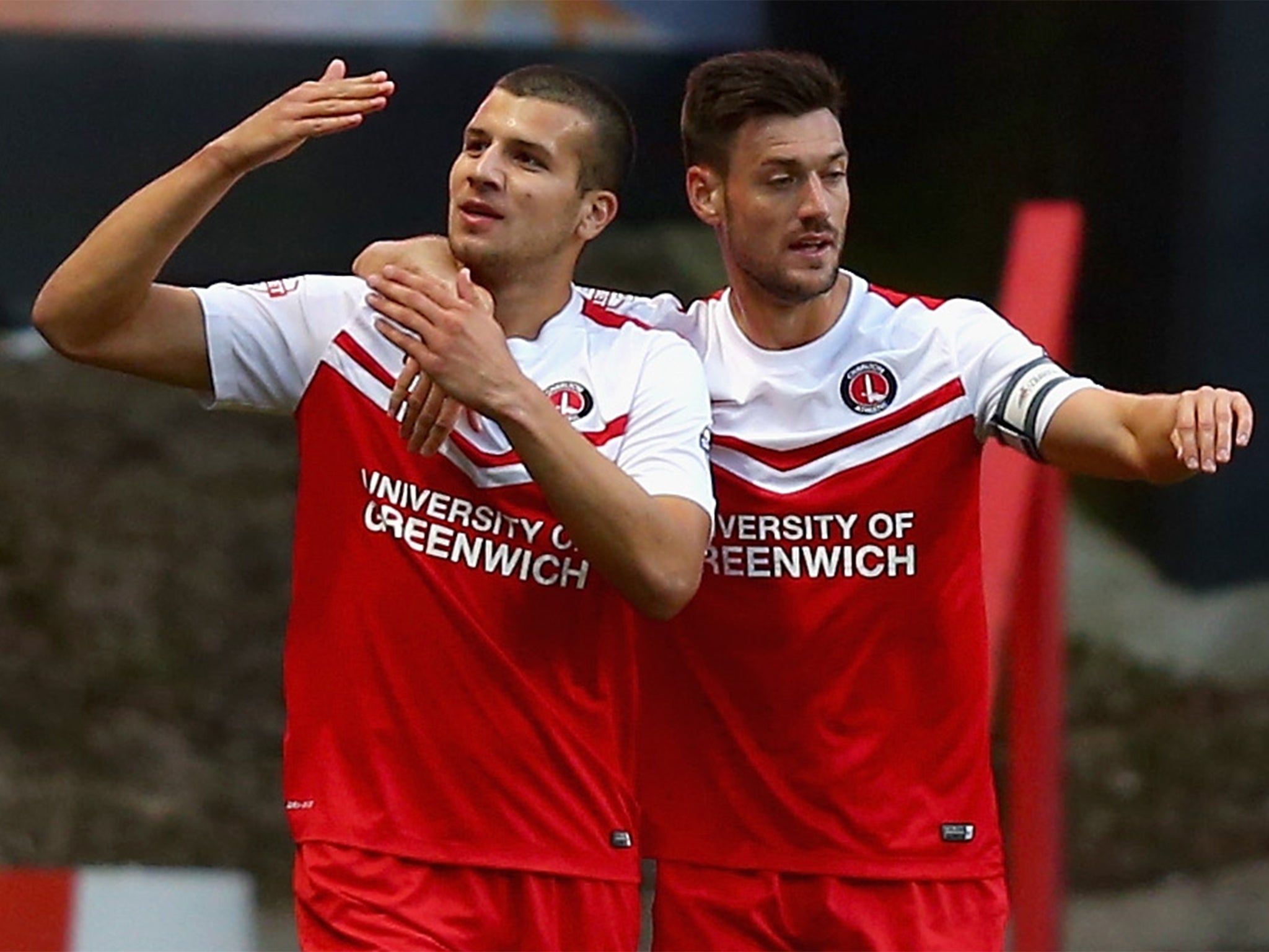 Charlton's George Tucudean, left, celebrates his goal