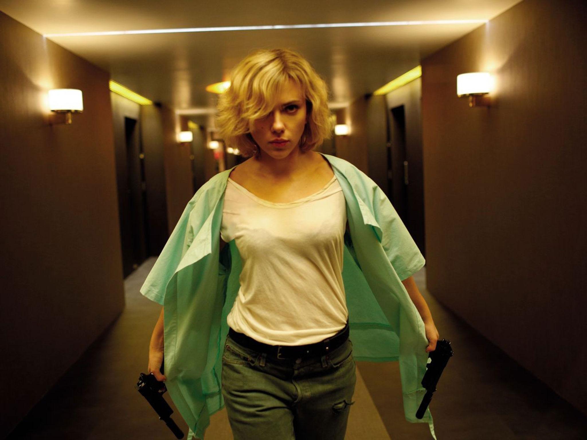 Loaded weapon: drugs have surprise side effects for Scarlett Johansson in Luc Besson's 'Lucy'