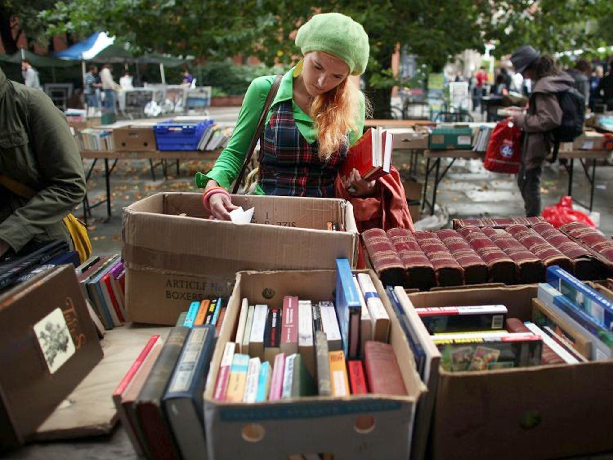 A student sifts through second-hand books at the University of Manchester. Sticking to a budget is the first step in making your money last the course