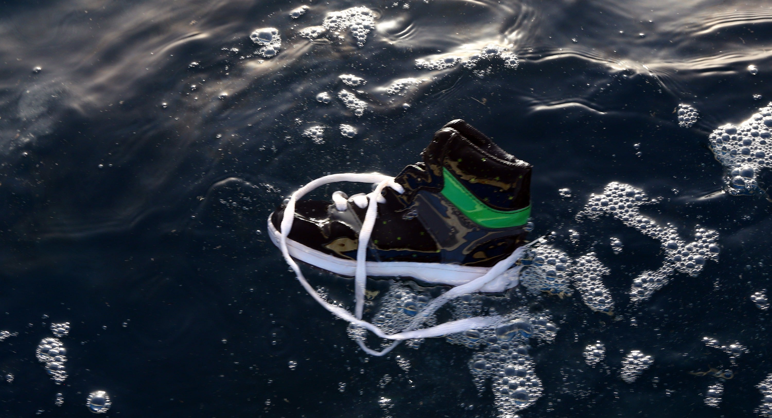 Boat crossings from Libya can be deadly - this shoe was seen floating after one carrying 170 migrants sank in August