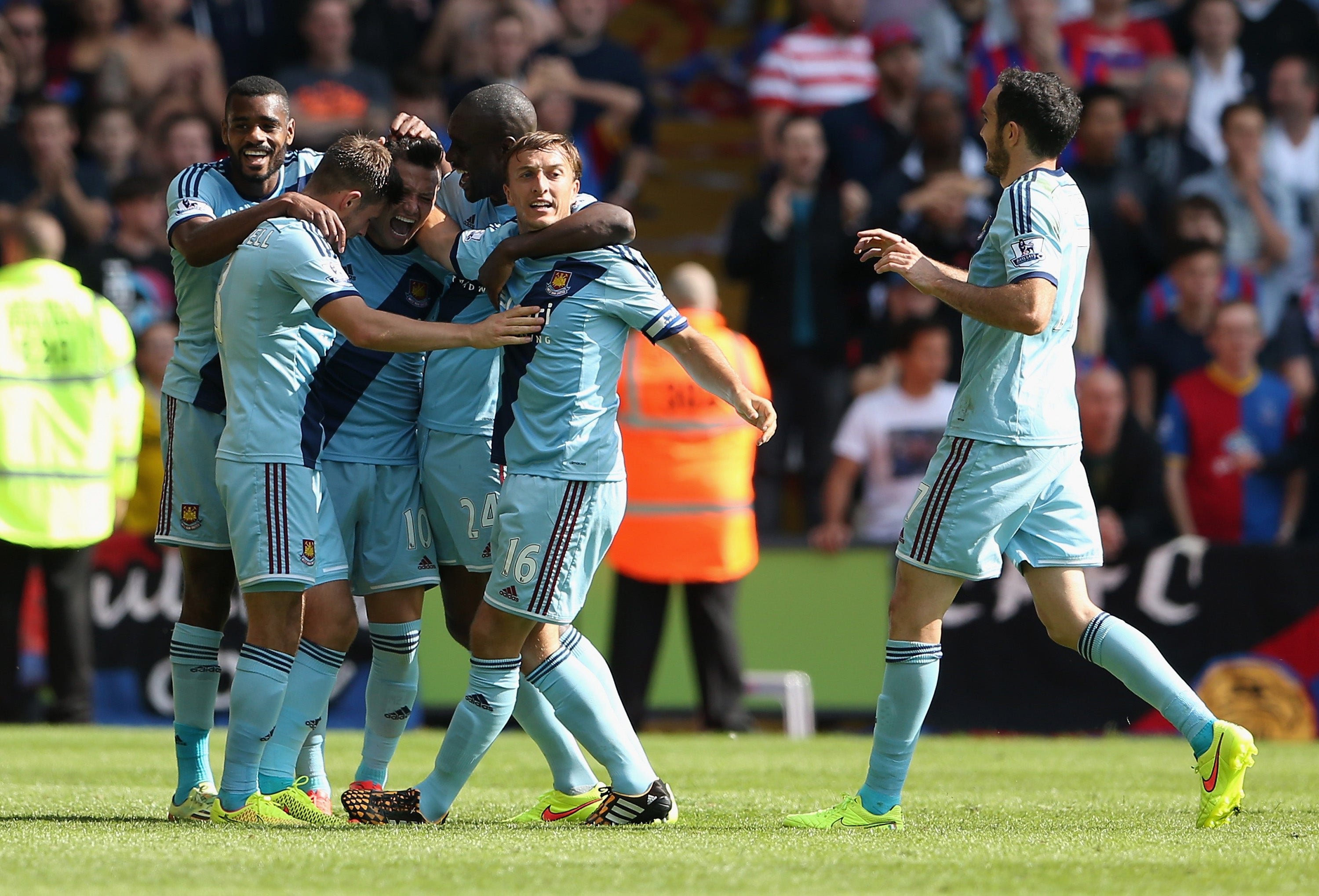 Mauro Zarate celebrates his opening goal with his West Ham teammates after putting the Hammers ahead in the 34th minute