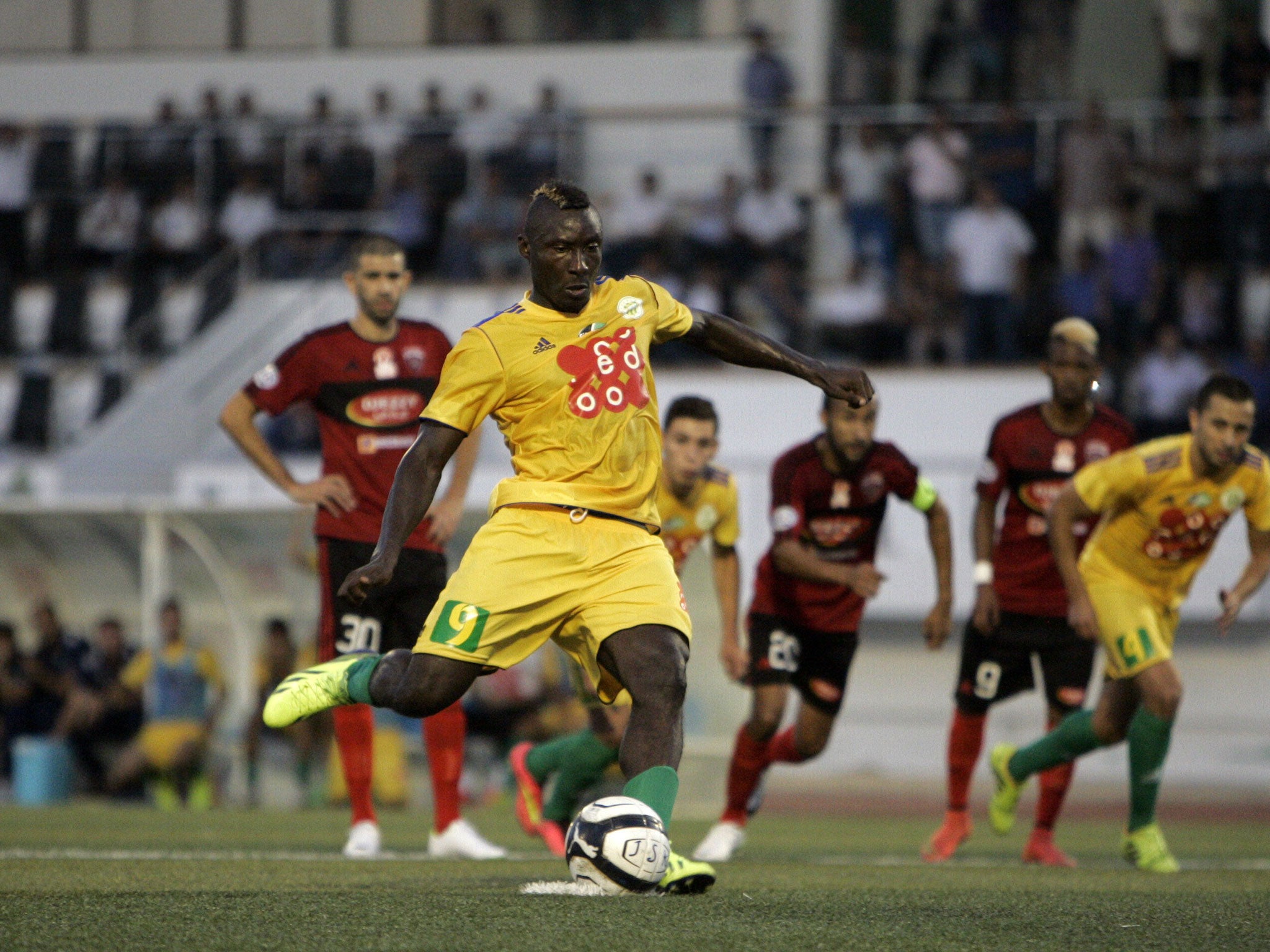 The Algerian Football Federation has suspended football indefinitely after the death of Albert Ebosse, who died after being hit on the head by a stone thrown from fans.